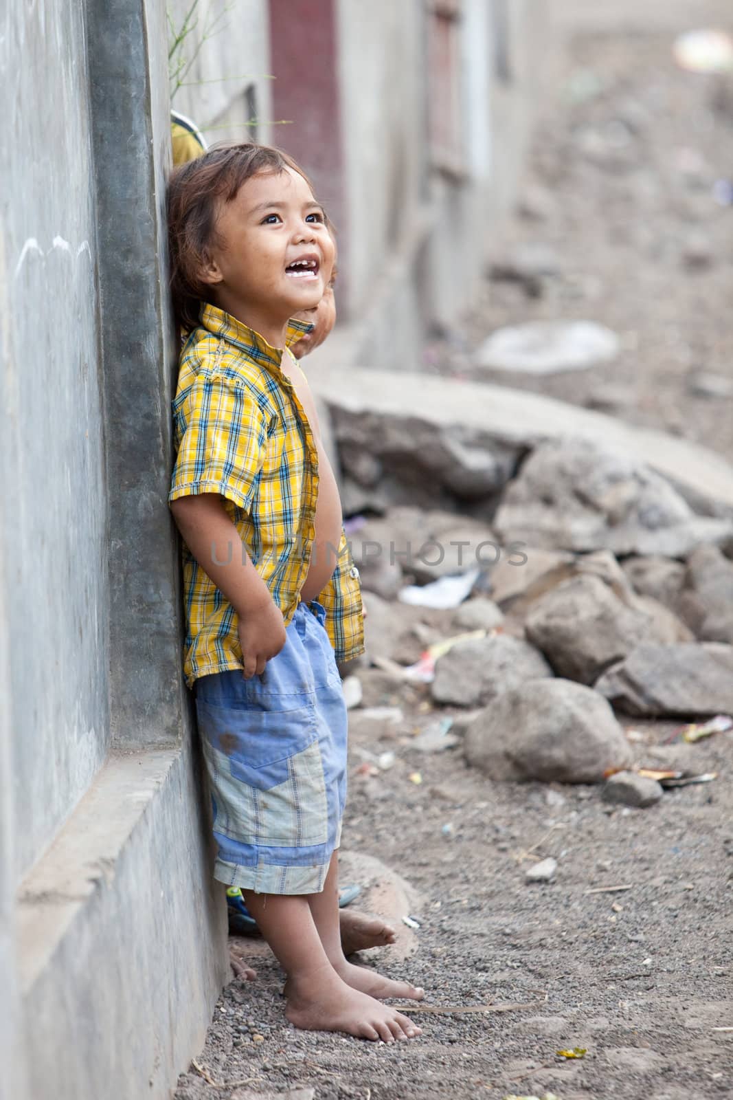 Laughing young kid in Lombok, Indonesia
