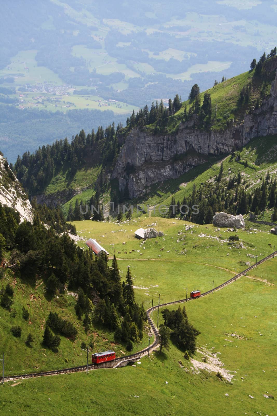 red swiss rack railroad in the mountains