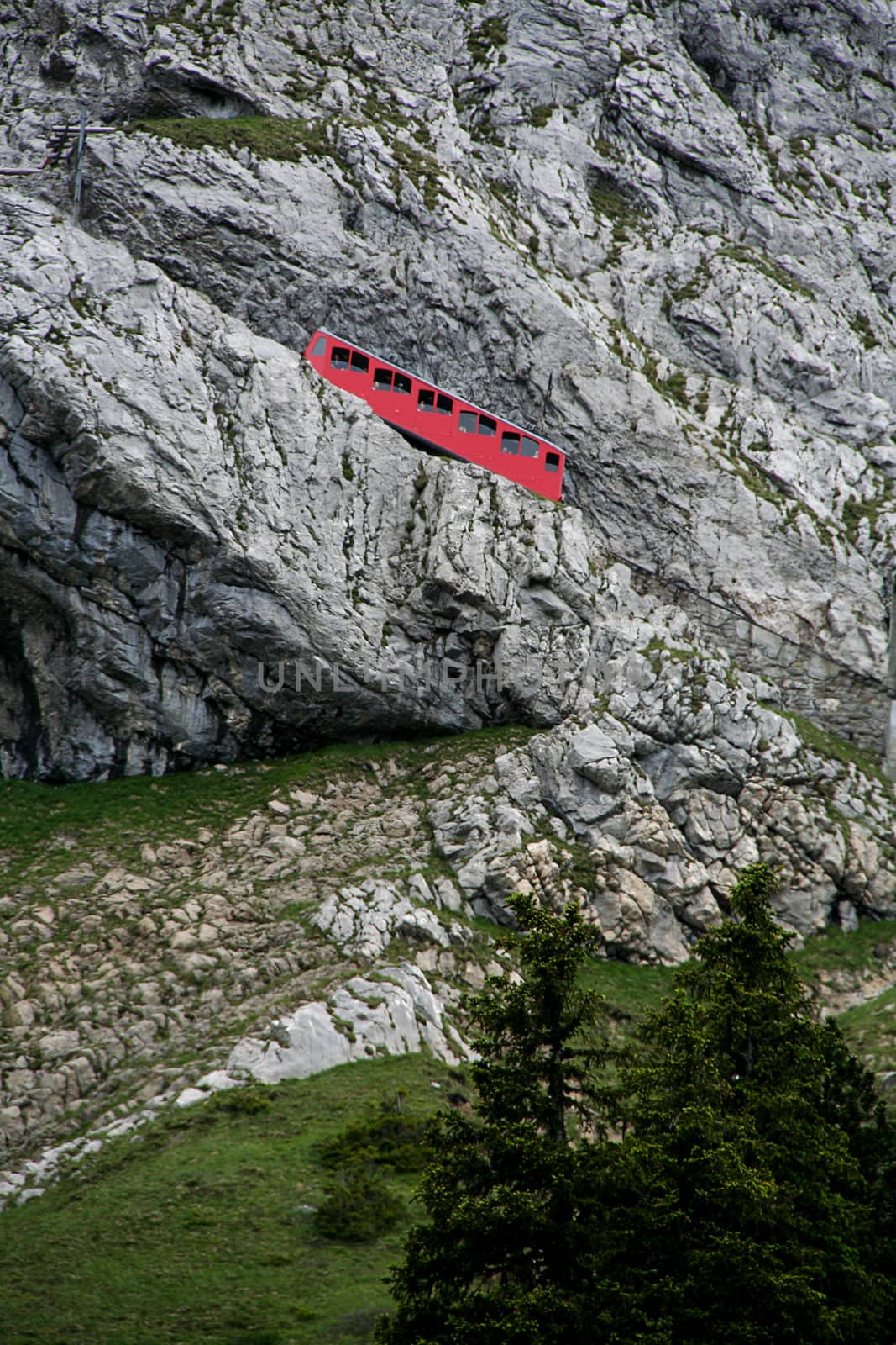 red swiss rack railroad in the mountains
