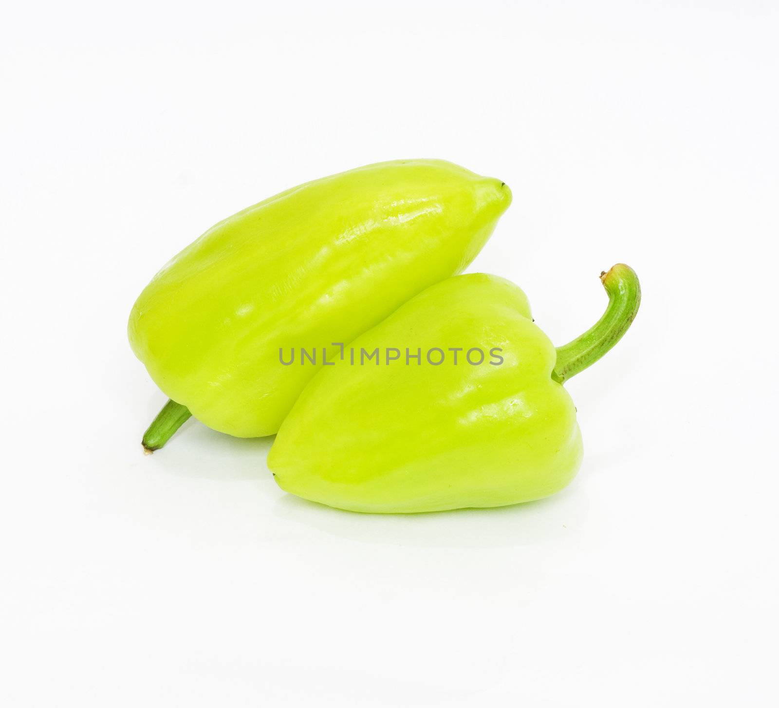 Green pepper on white background by schankz
