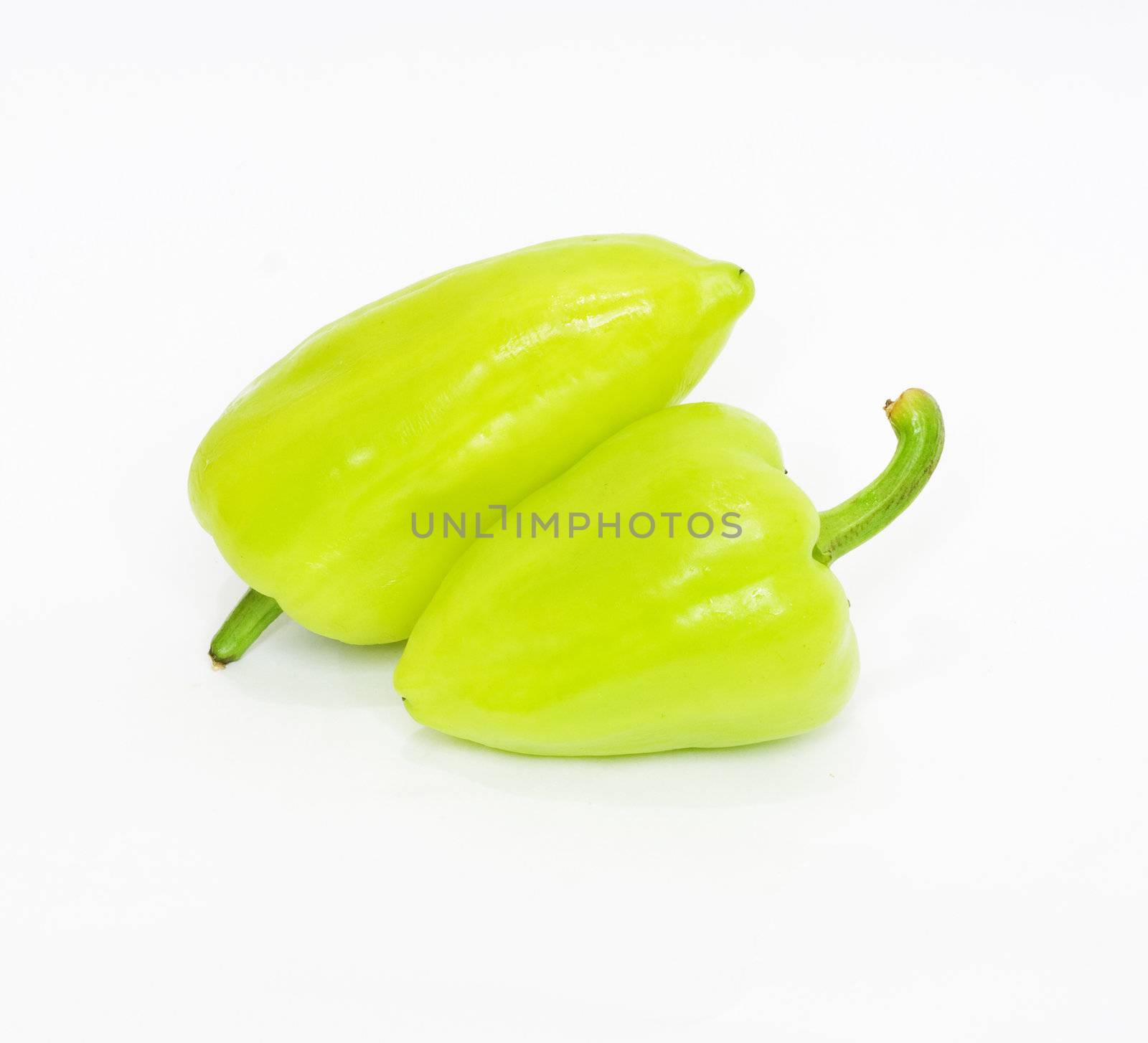 Green pepper on white background