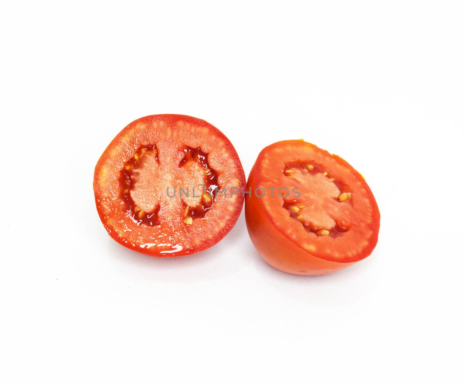 sliced fresh red tomato  by schankz