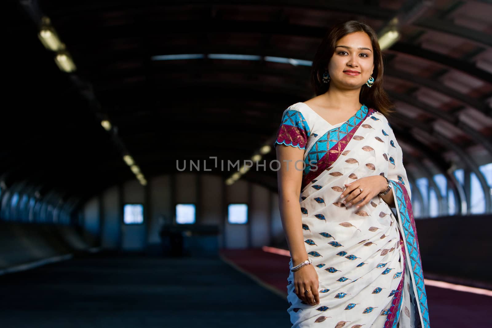 Attractive indian lady in traditional costume saree celebrating deewali religious festival of india