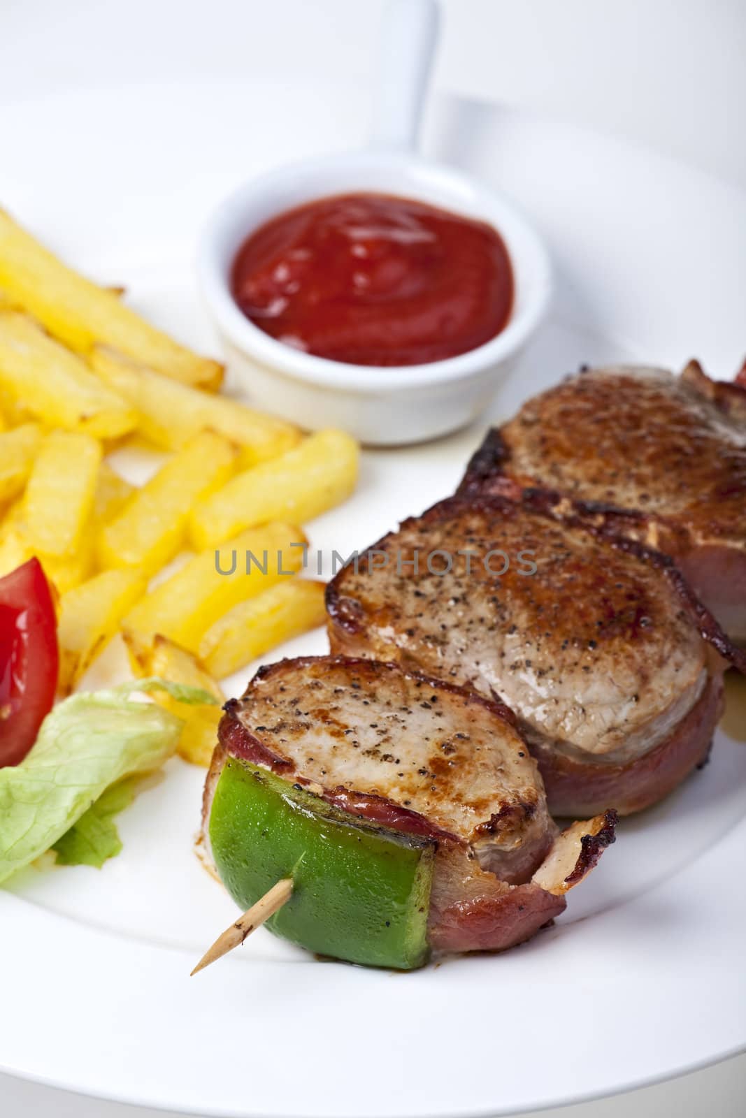 grilled fillet of pork and french fries