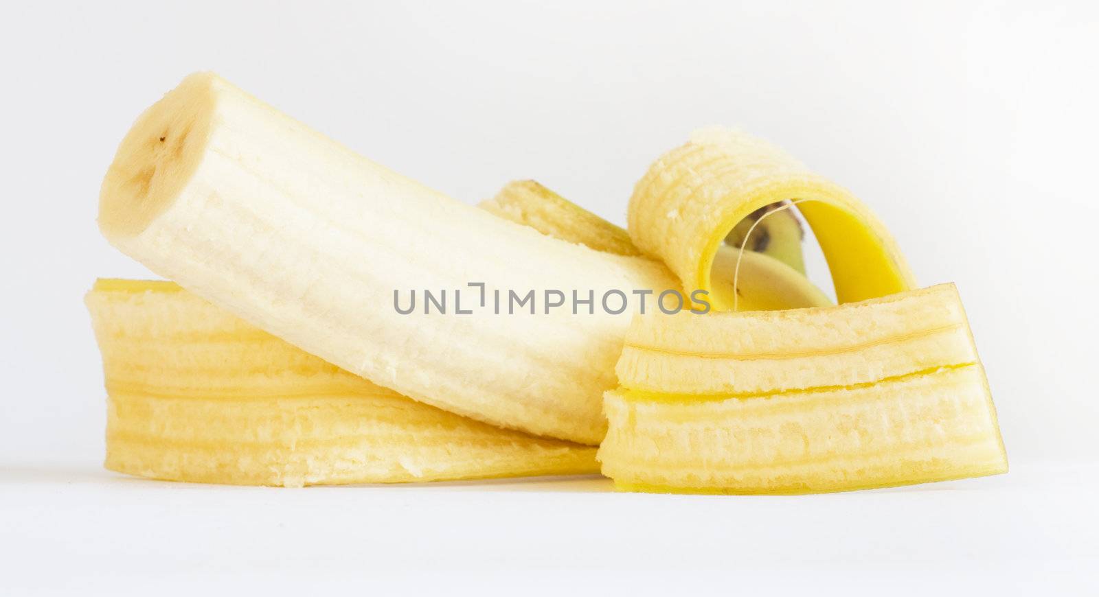 Open banana isolated  by schankz