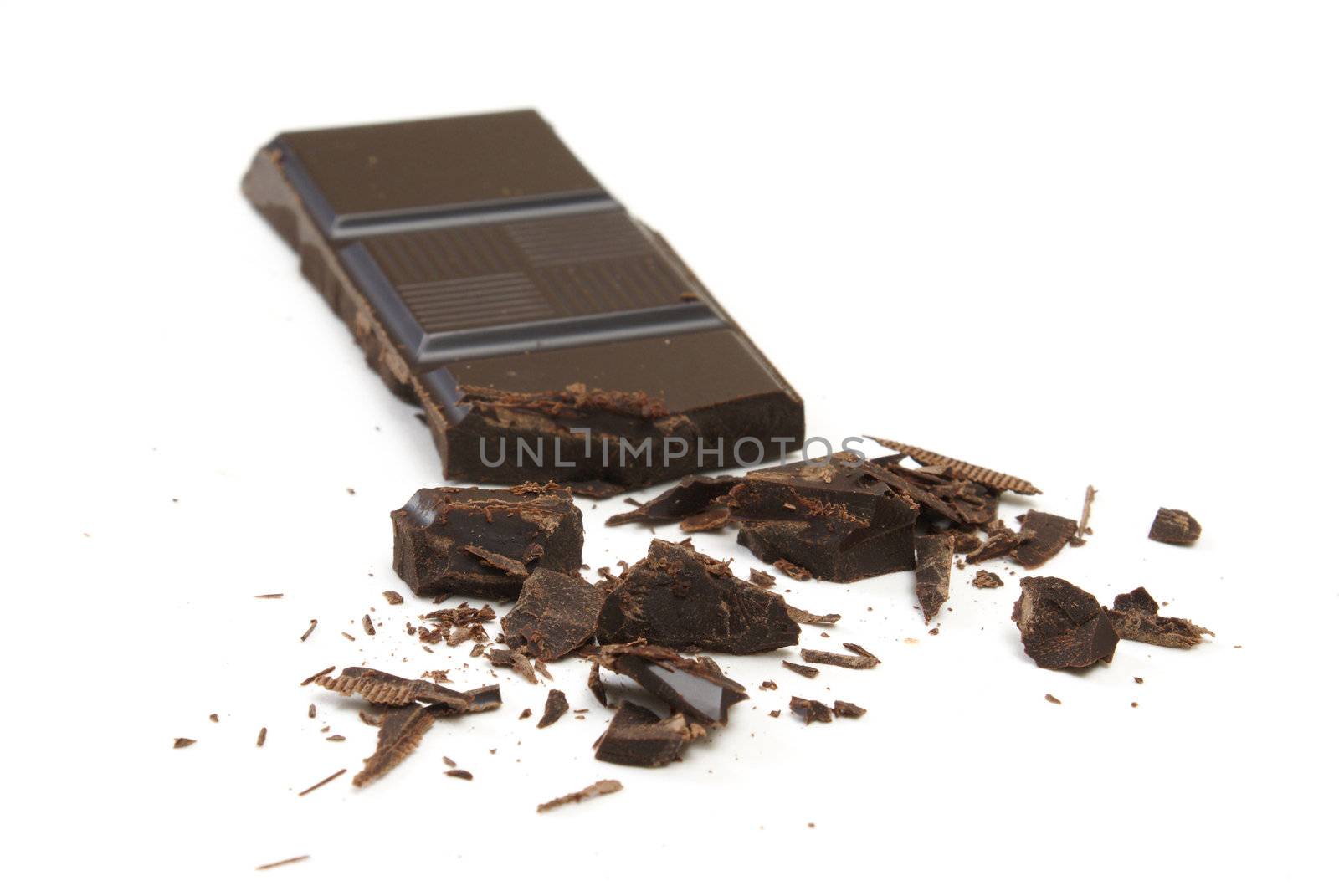 Pieces of chocolate with some crumbled off.