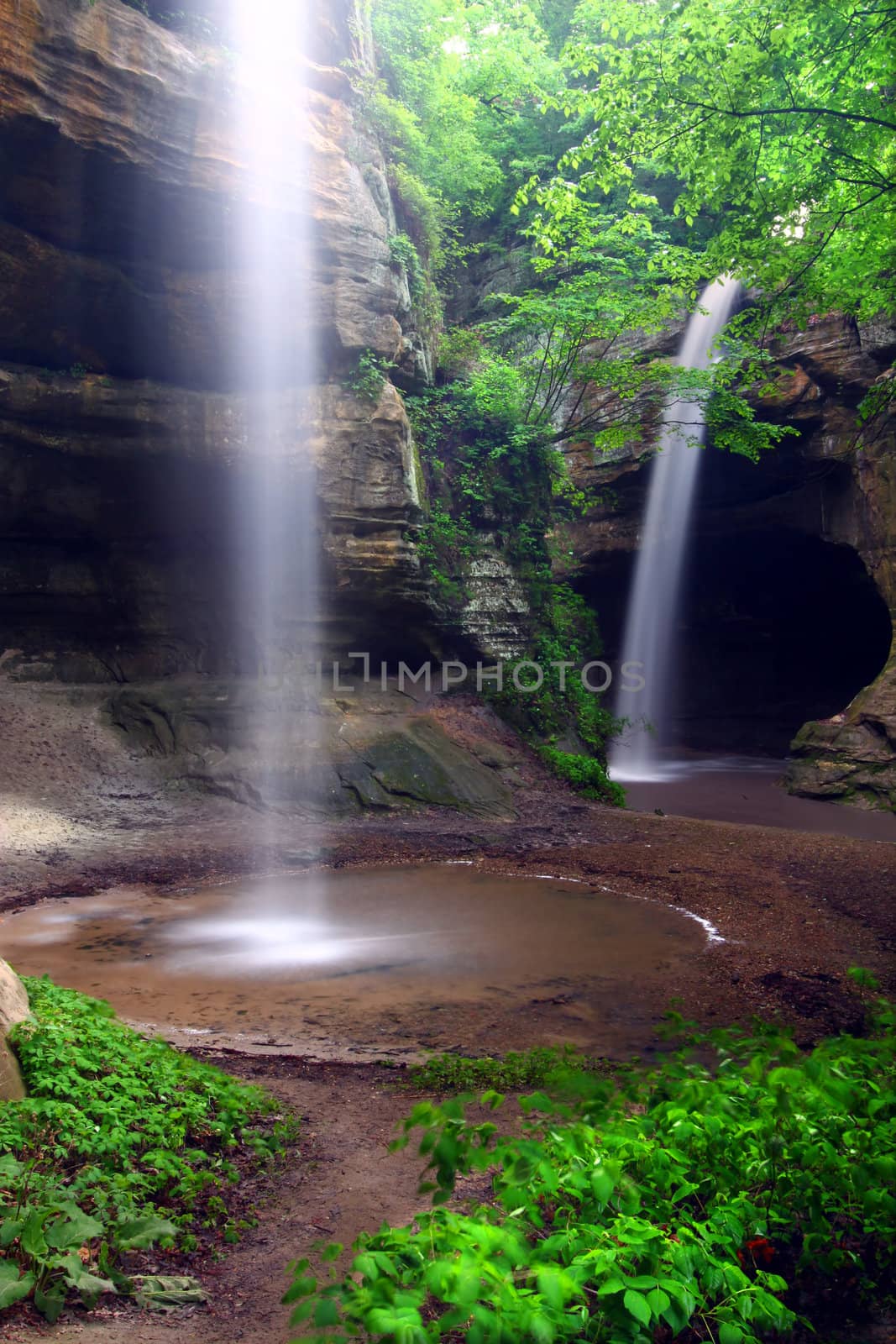 Waterfalls flow into Tonti Canyon on a spring day at Starved Rock State Park.