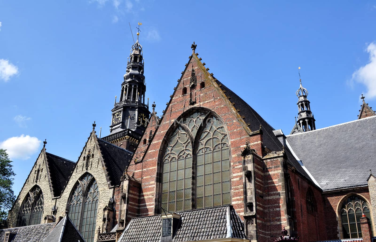 Oude kerk, details of bell tower in Amsterdam city.