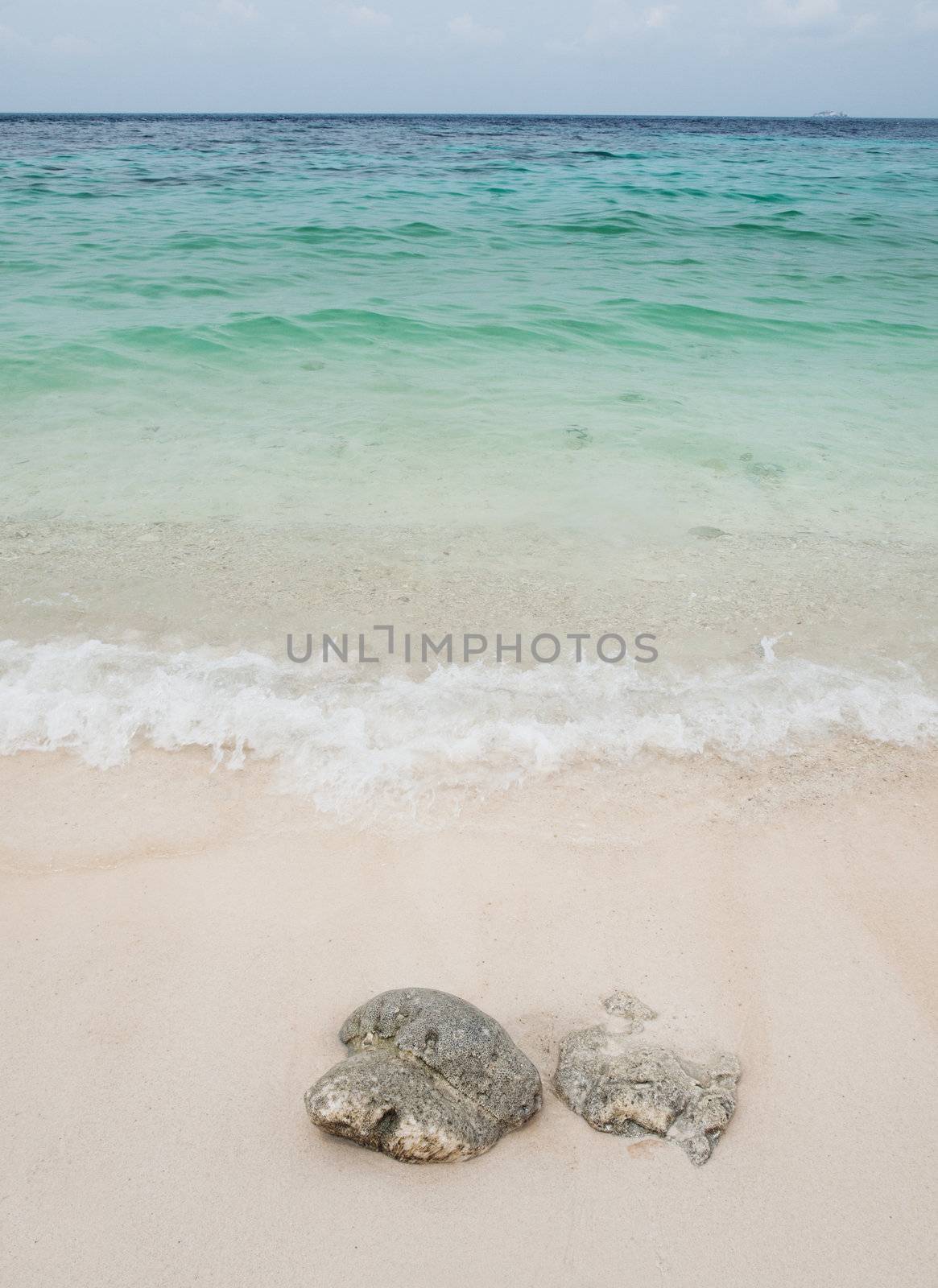 Beautiful beach with corals in  Long beach Coral Island