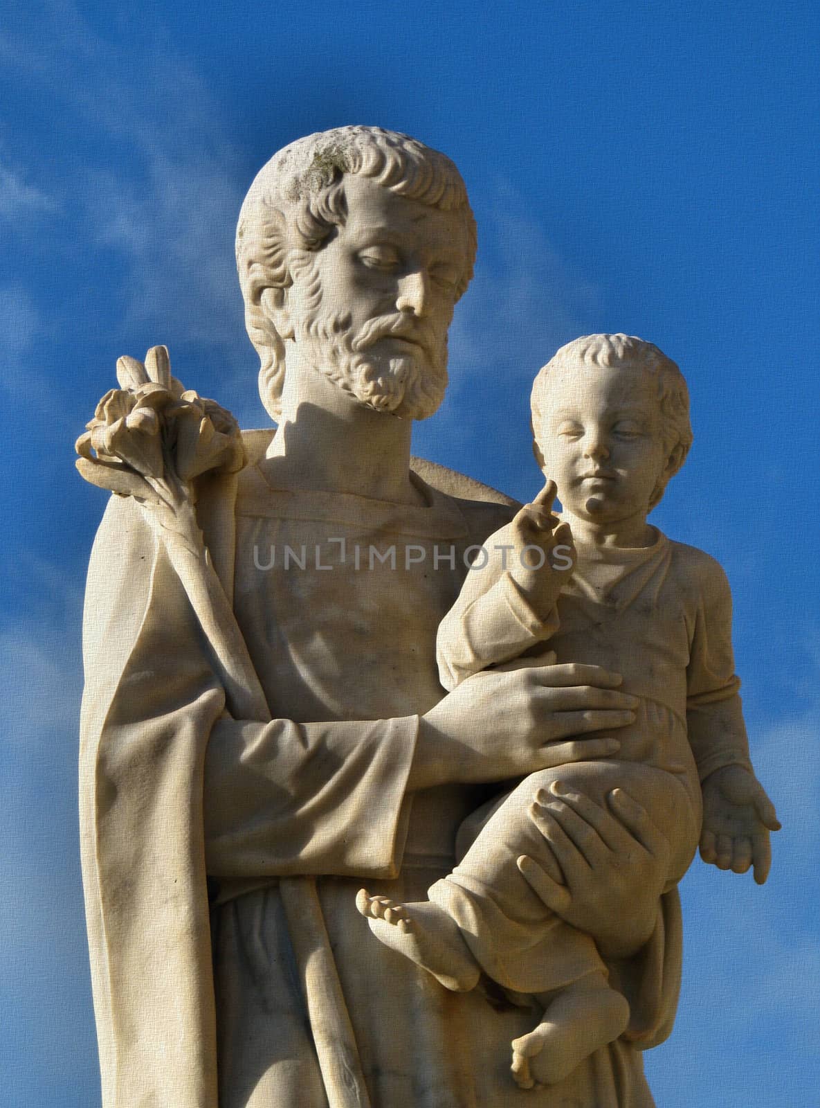 The marble statue of St. Joseph in the square of Ta' Pinu sanctuary at Gharb, Gozo - Malta.