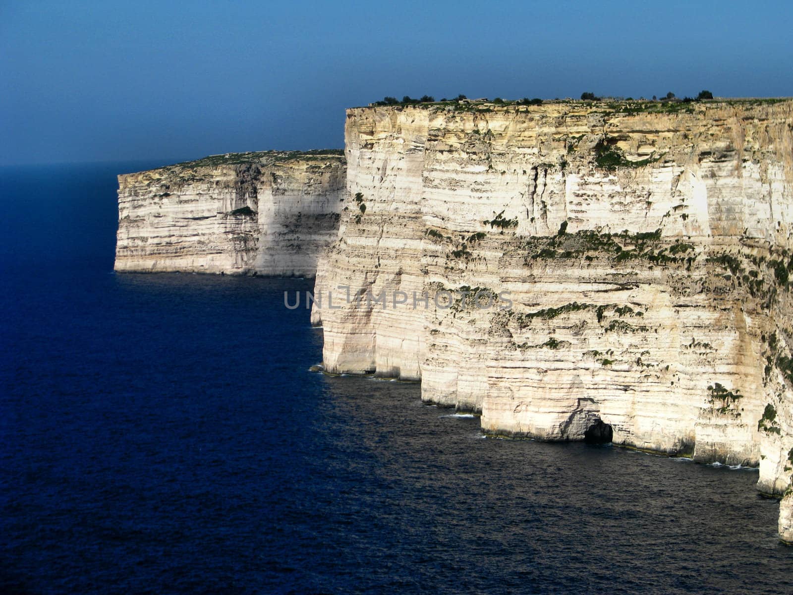 Beyond the village of Sannat are the majestic cliffs of Ta Cenc, the highest point on Gozo, affording spectacular views and great for coastal walks. The cliffs at Ta Cenc are also home to some interesting archaeological sites, including the remains of a temple and some standing stones.