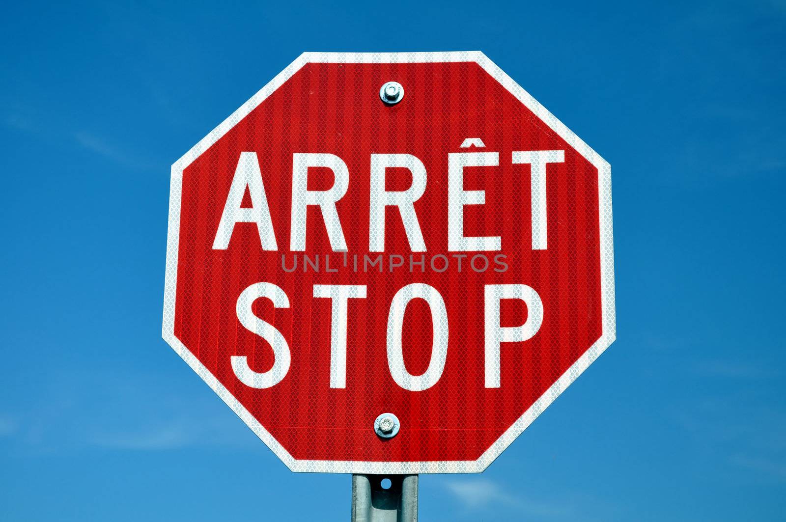Bilingual French English stop sign in Quebec, Canada