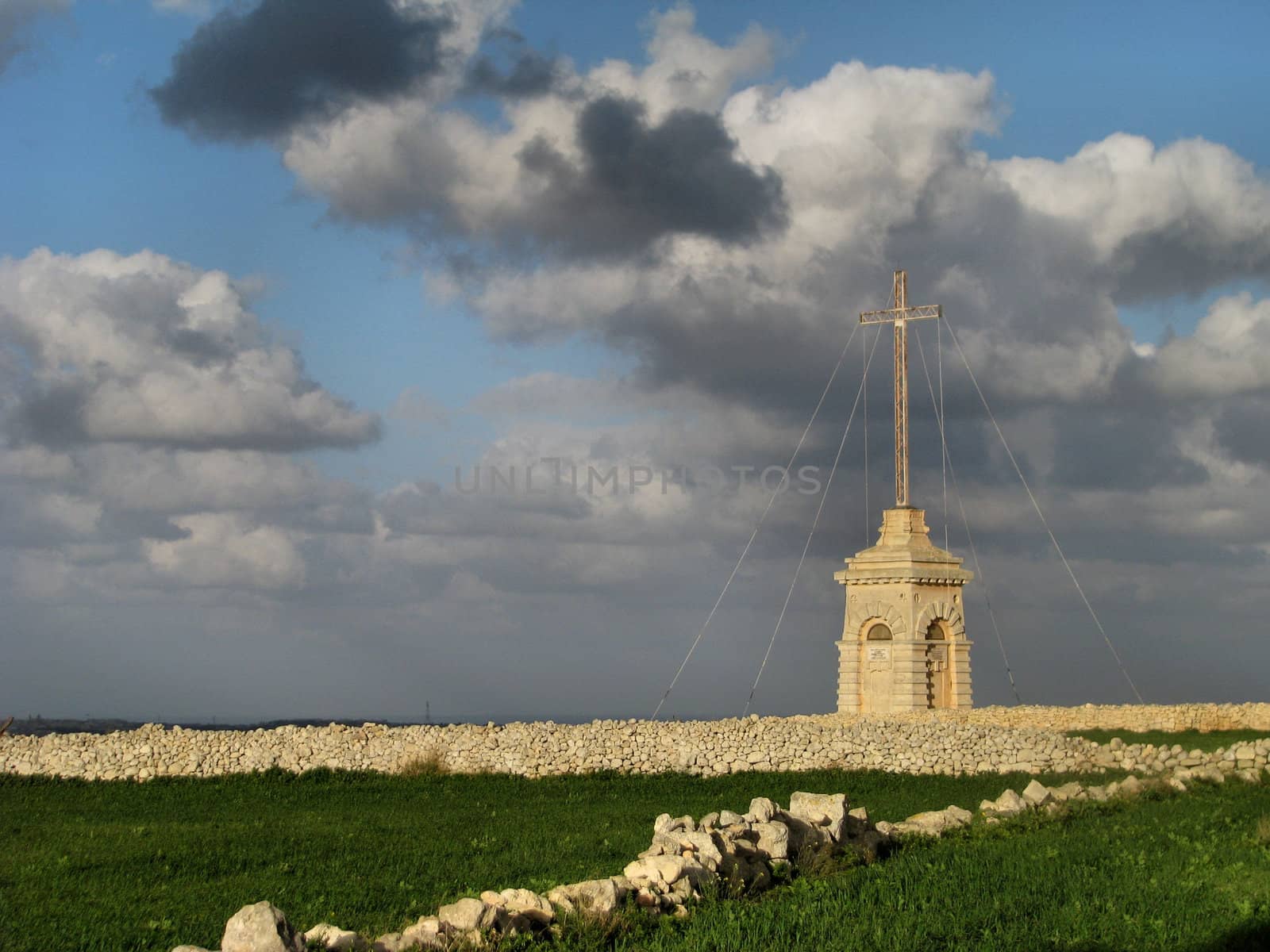 The huge iron cross and stone pedestal on the hilltop in Siggiewi was built at the turn of the century by Don Pawl Laferla. Laferla's Cross, or better known as is-Salib ta’ l-Gholja, is a well-known landmark in Siggiewi. It is from this point that one can have beautiful scenic views of the Maltese islands.