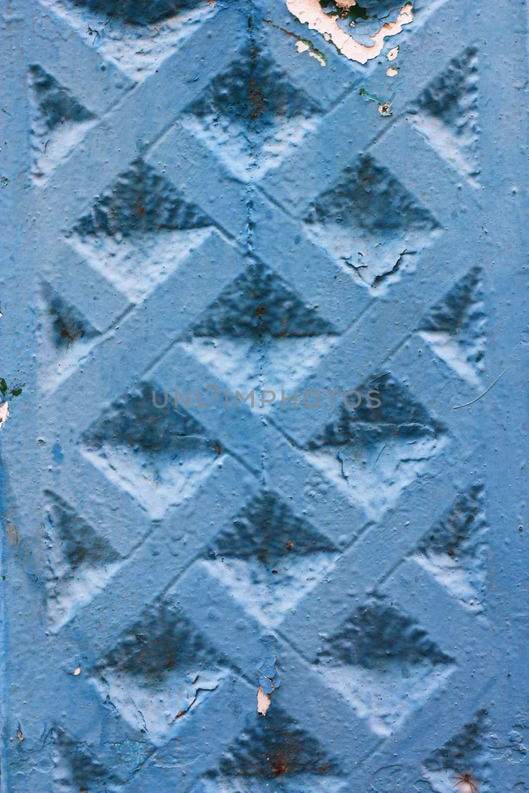 Abstract background of a concrete fence painted in dark blue