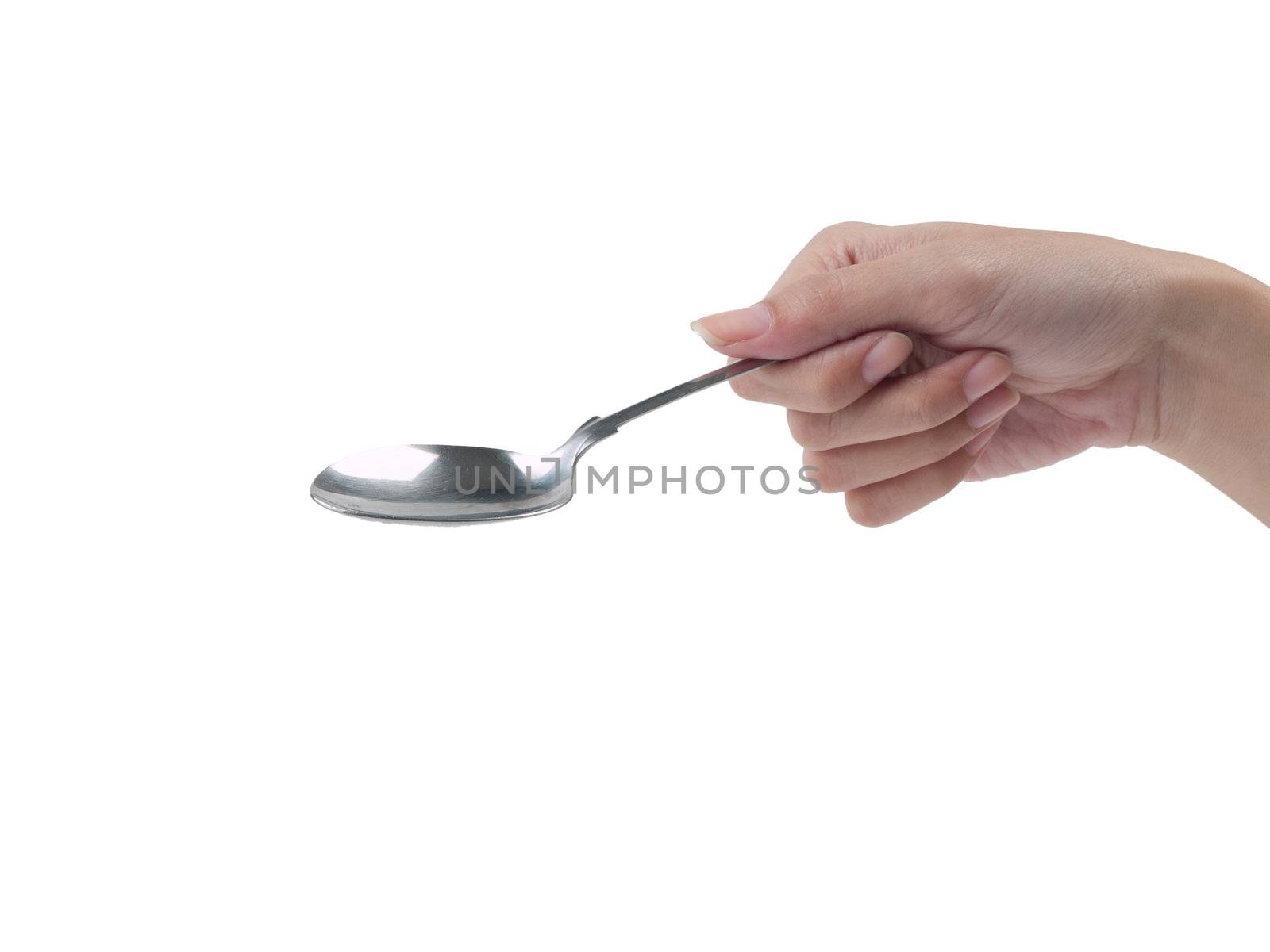 Spoon in hand on white background  by FrameAngel