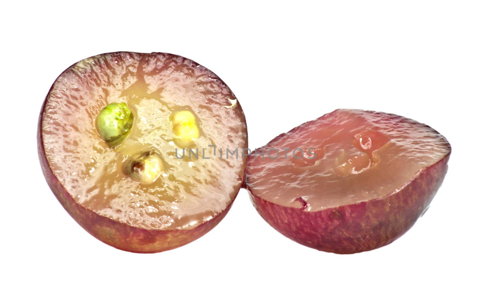 Translucent slice of red grape fruit, macro isolated on white 