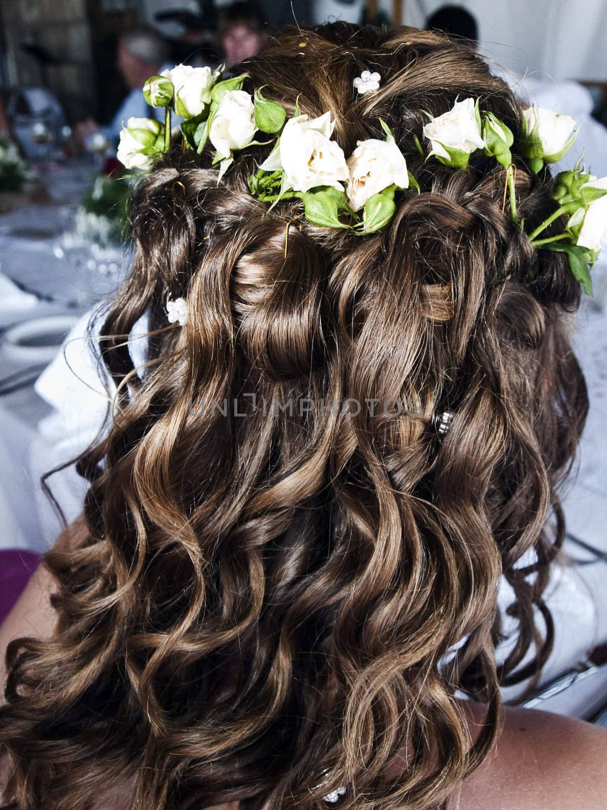 Detail of hairstyle and curls on a bridal hairdo