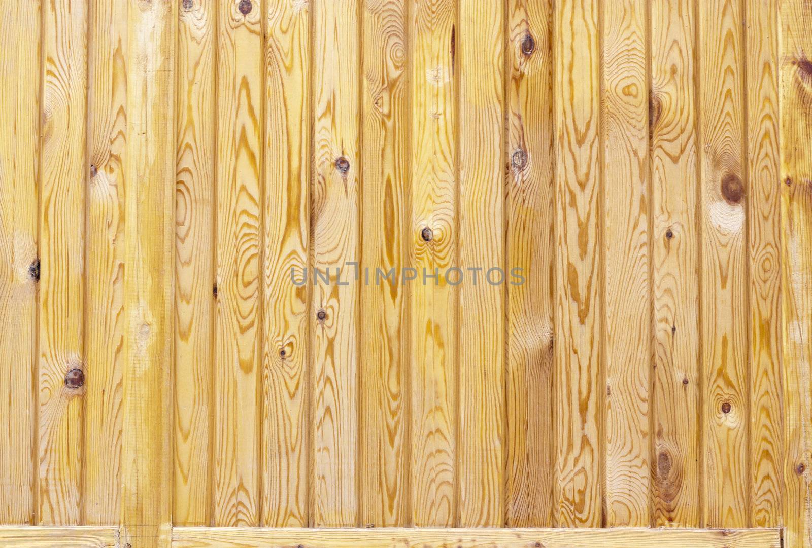 Close up of gray wooden fence panels  by schankz
