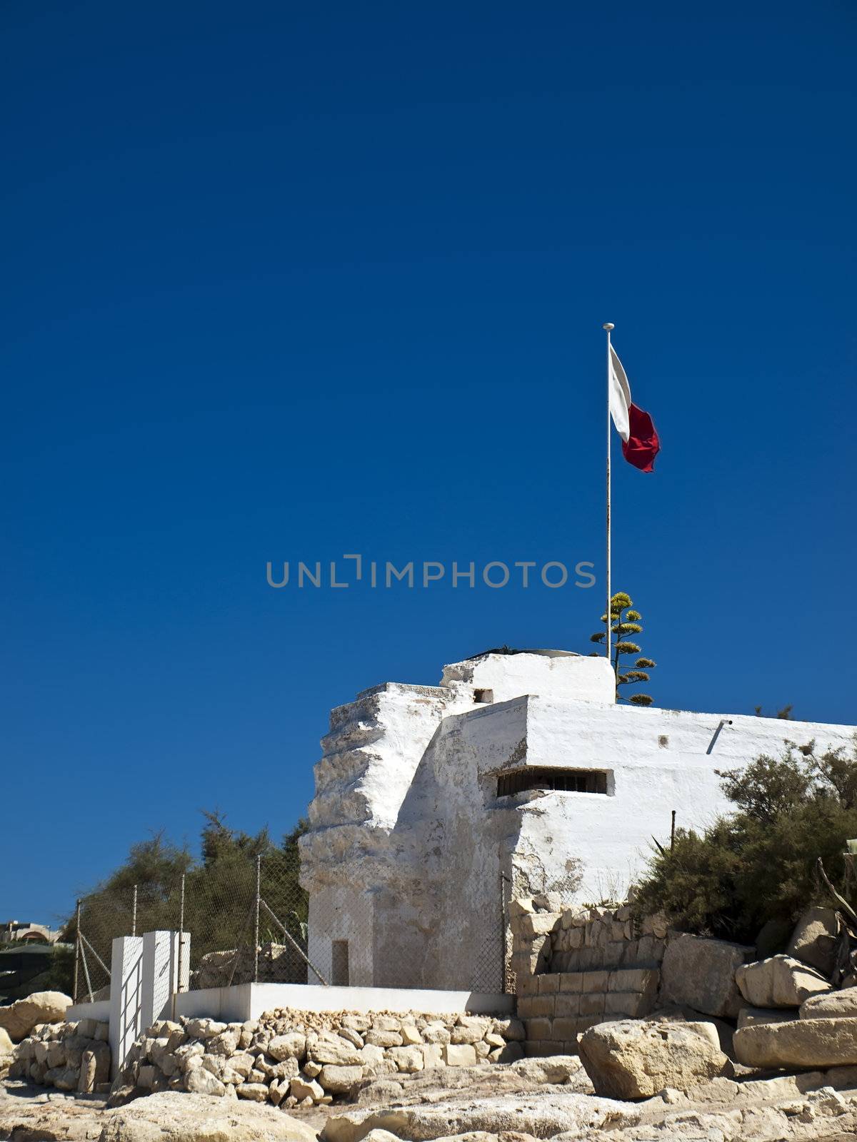 A WWII coastal gunpost painted in white and used as summer camp