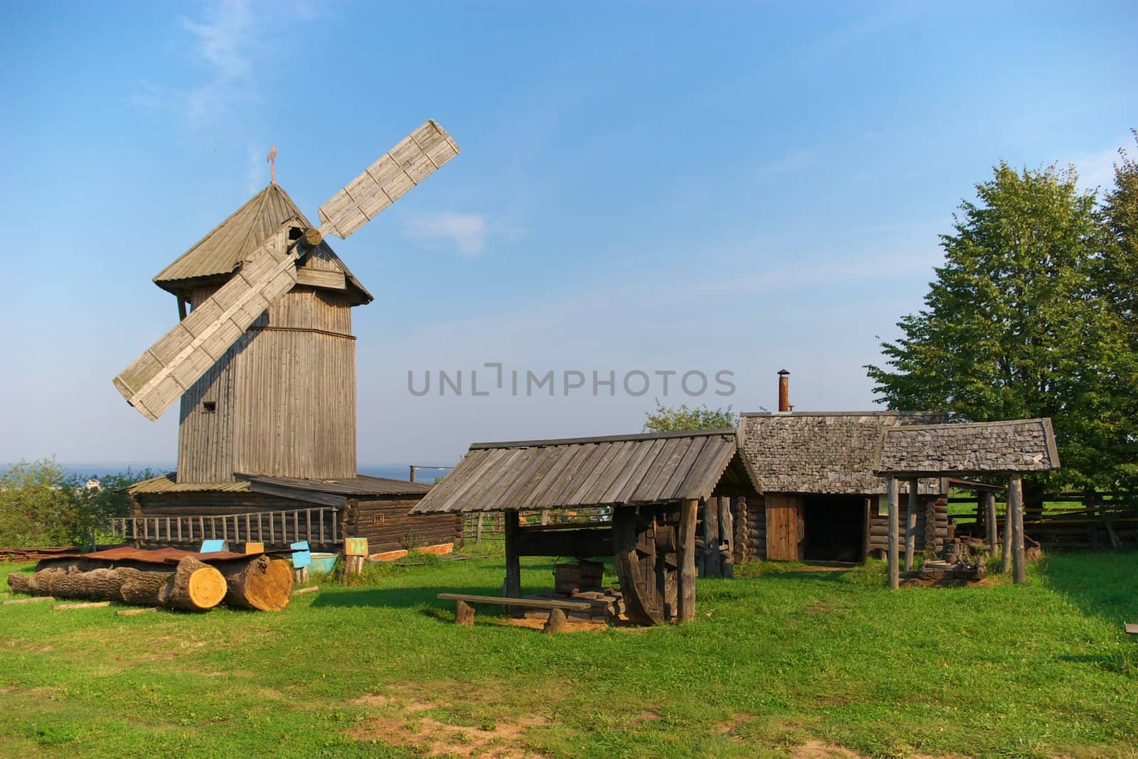 photo of the old - time wooden wind mill