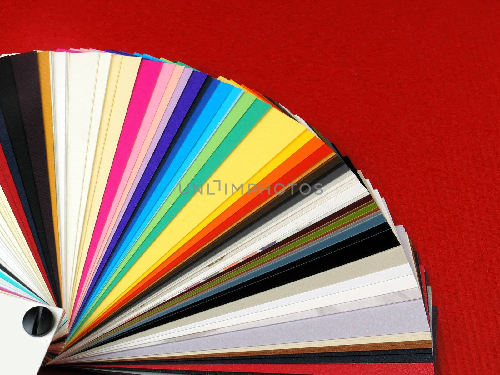 Colored samples of different papers on white background, business cards