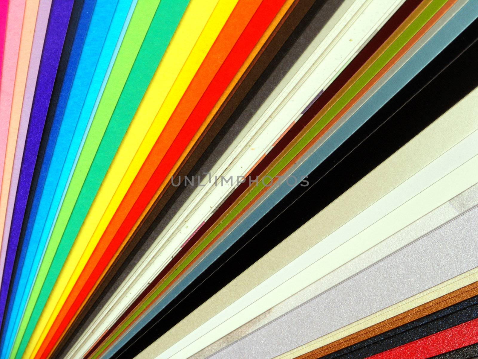 Colored samples of different papers on white background, business cards