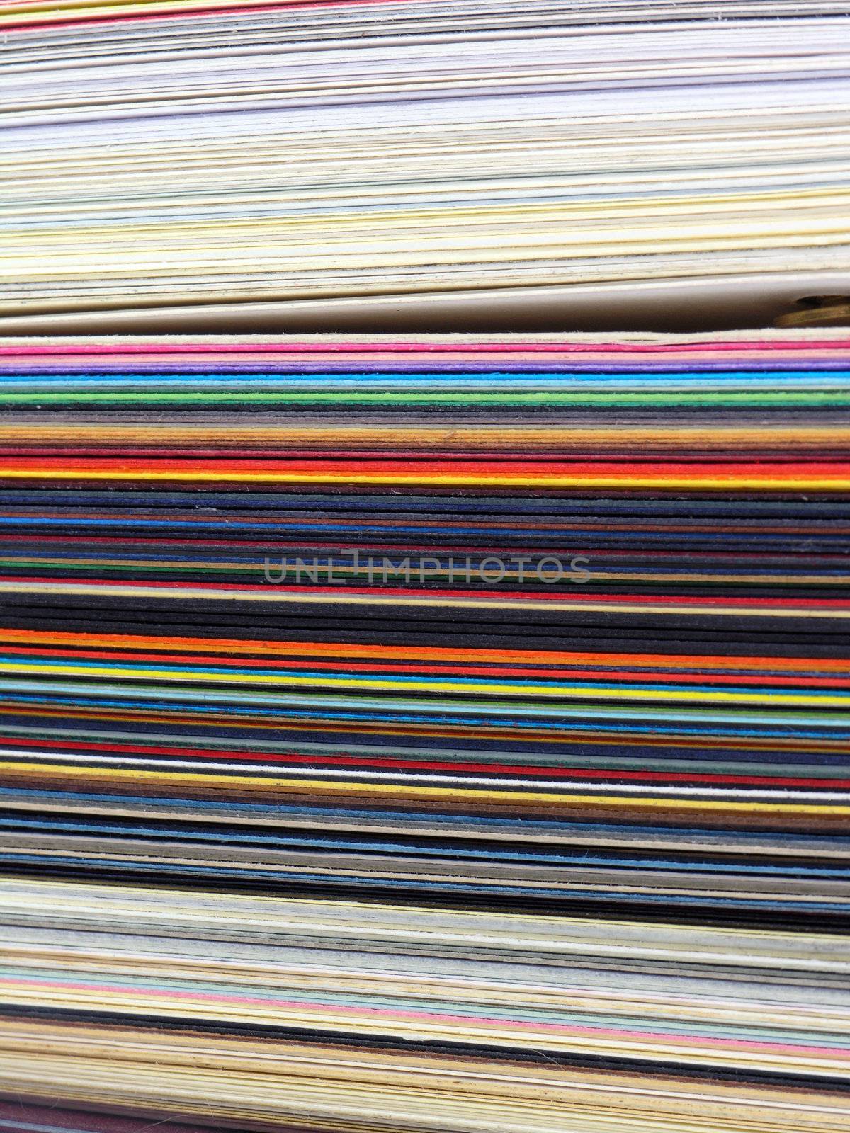 Colored samples of different papers on white background