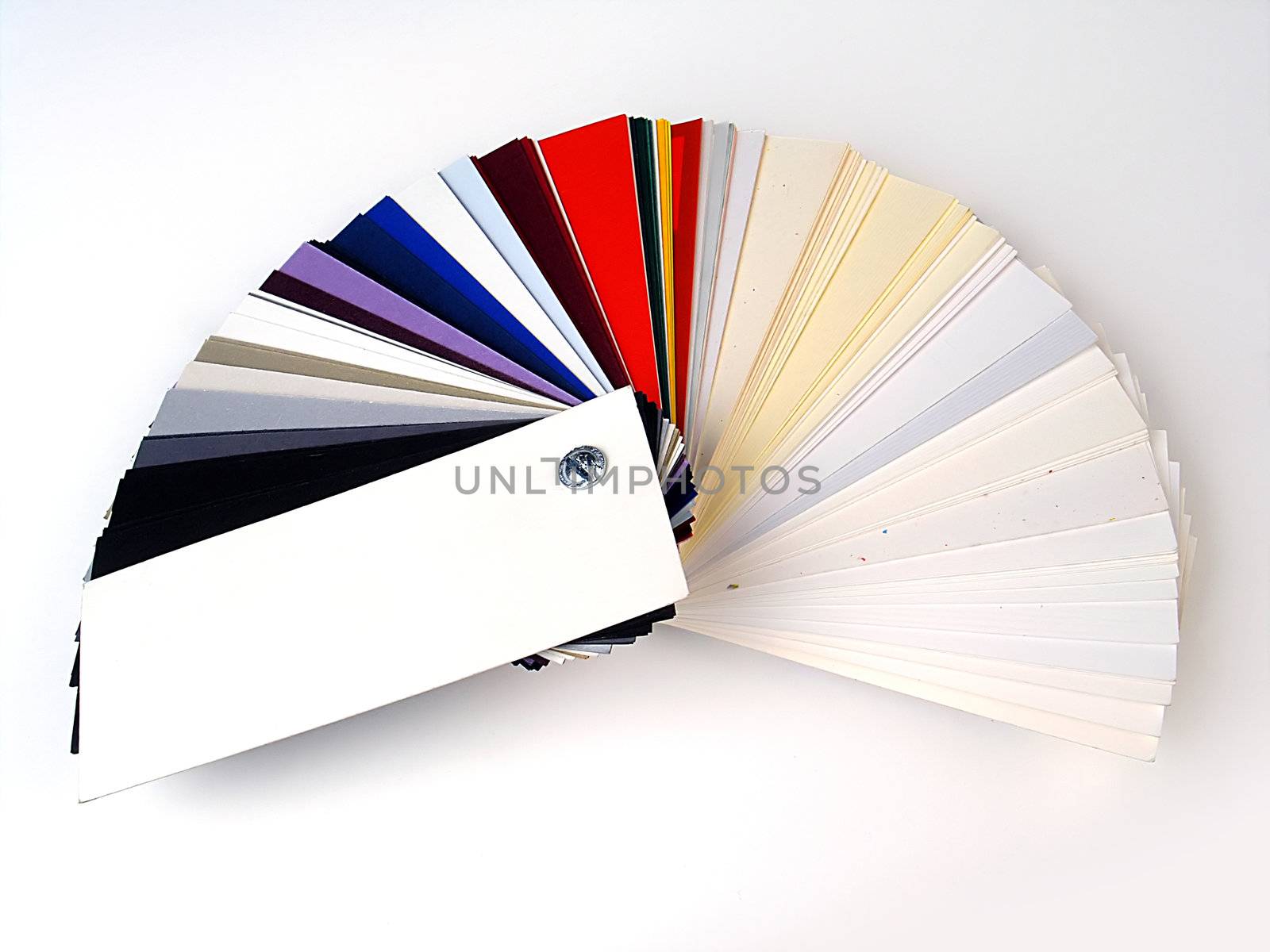 Colored samples of different papers on white background