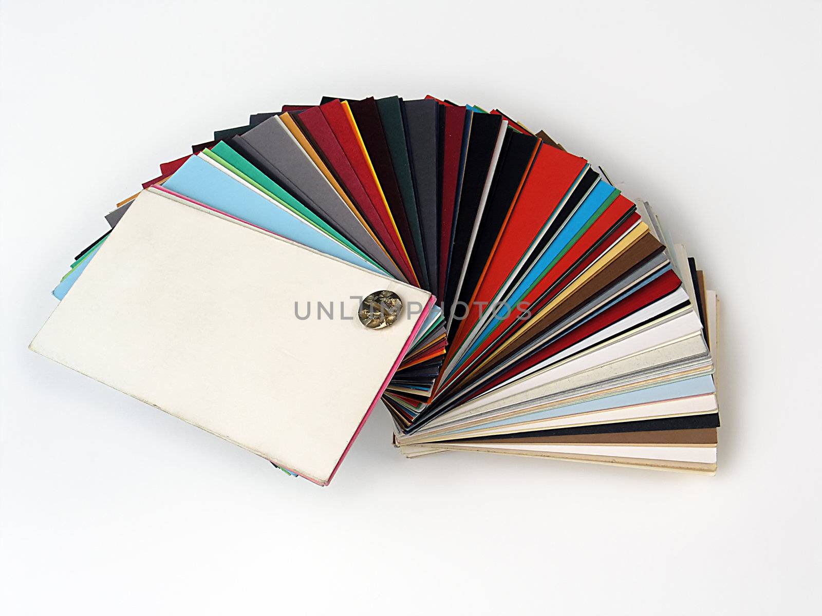 Colored samples of different papers on white background