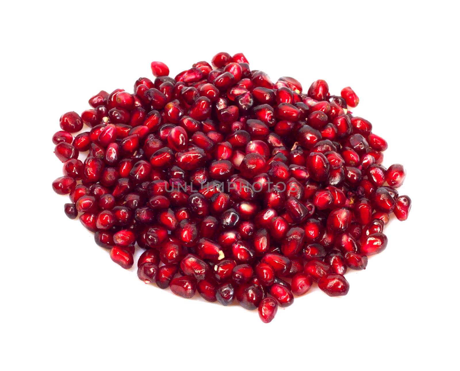 Extreme close up background of a red juicy ripe pomegranate fruit seeds 