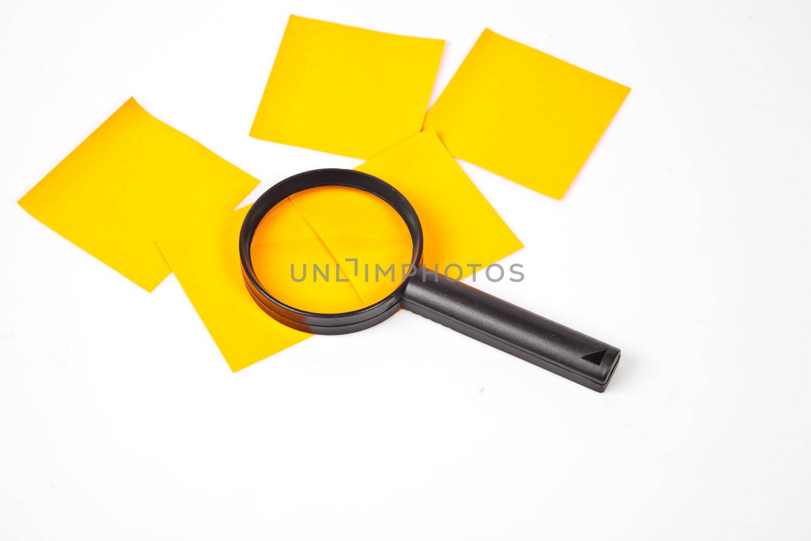 a magnifying glass hovering over the post-it Inspection by FrameAngel