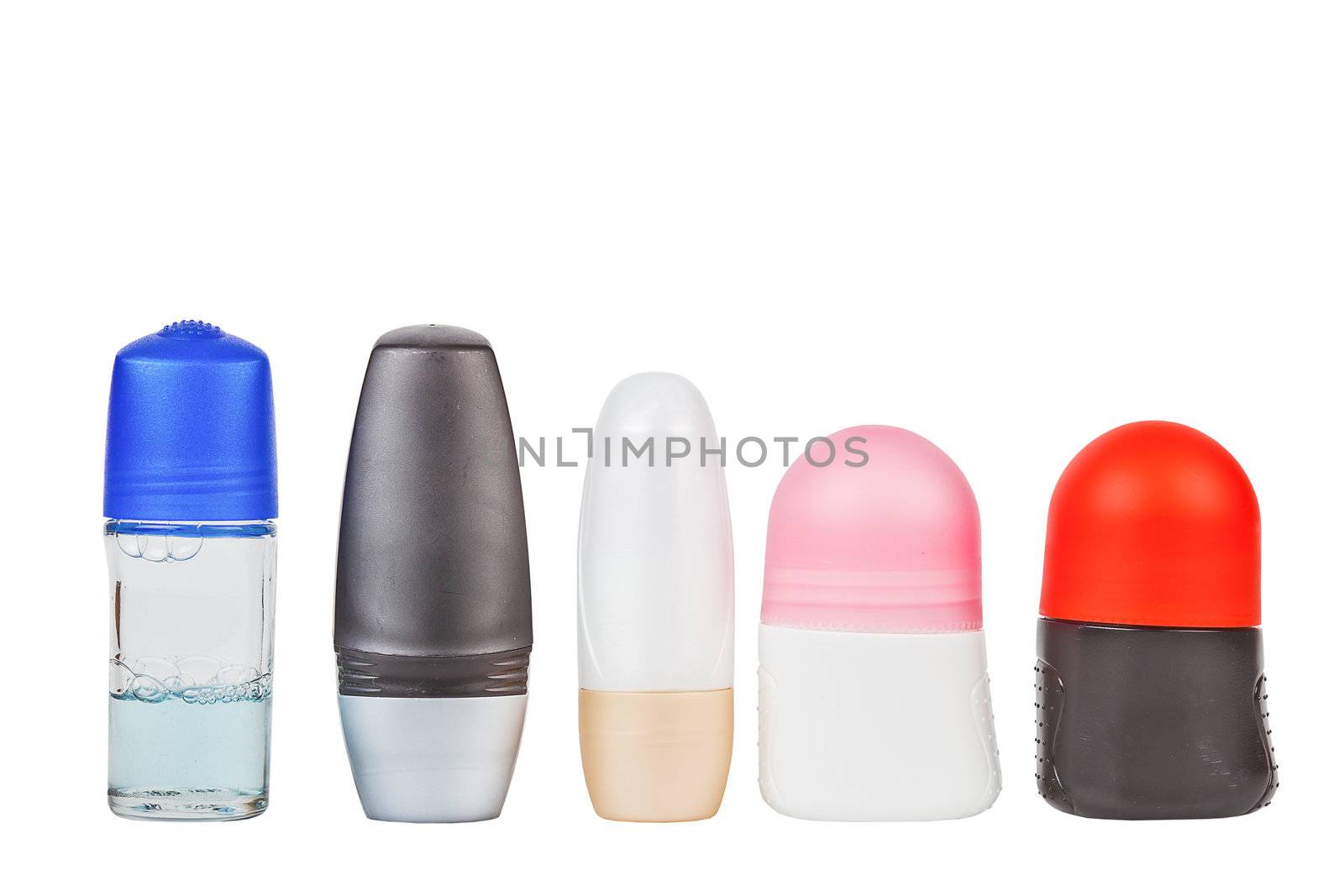 Colorful deodorant on white background