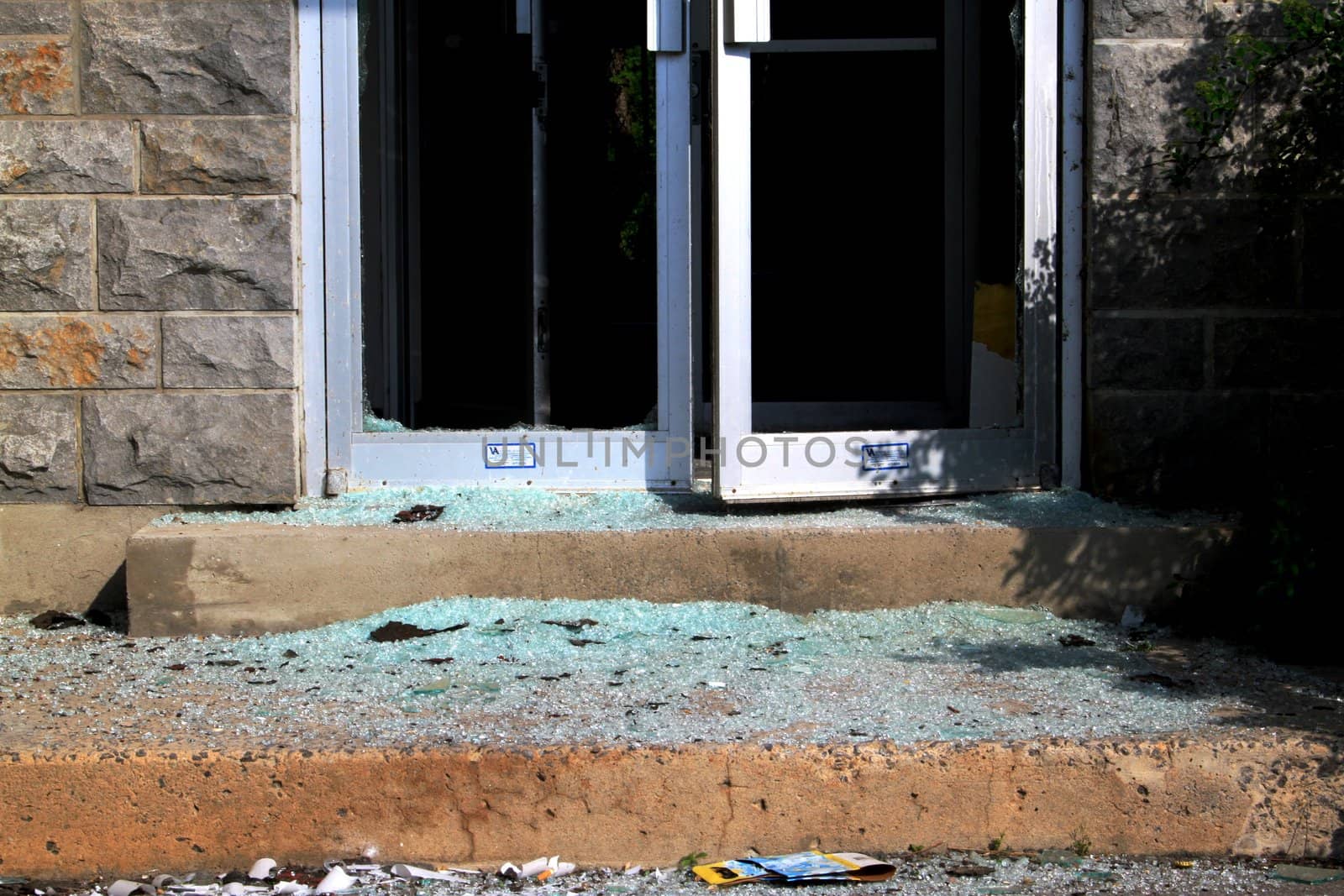 Broken glass doors by vandalism on historic building