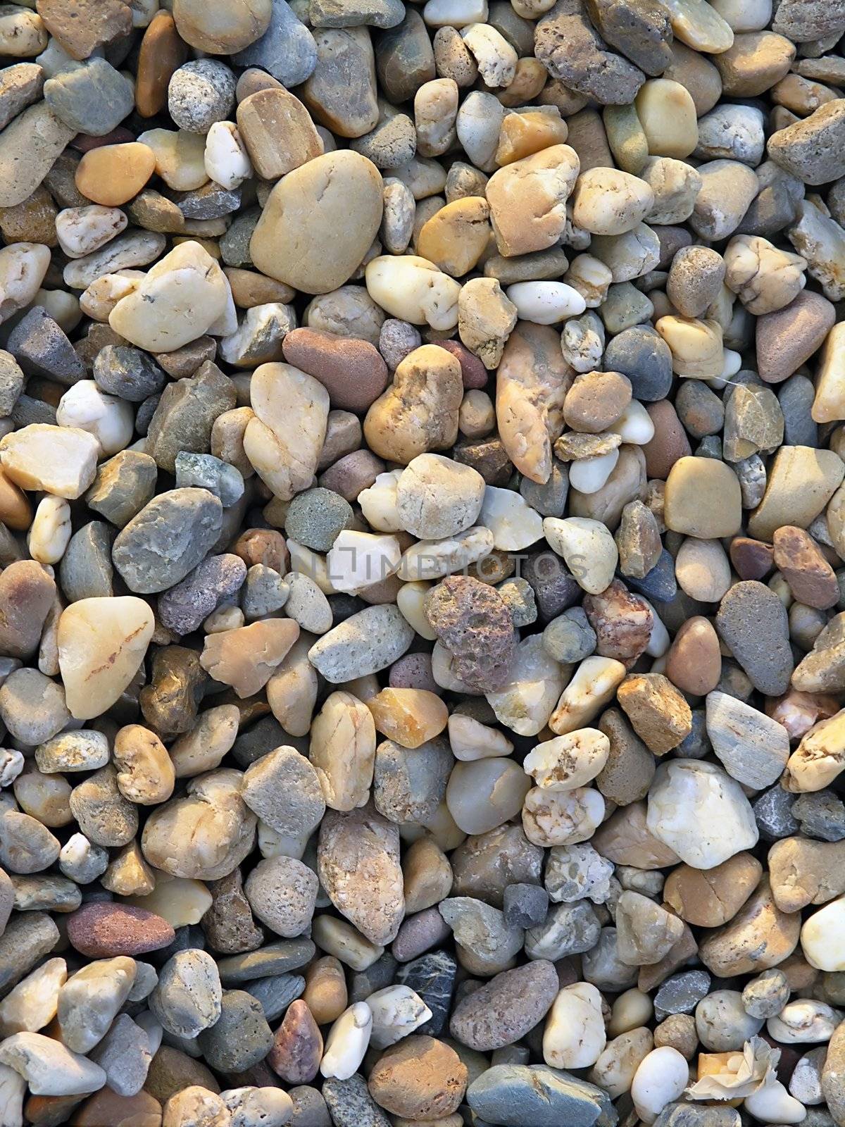 Rocks, sand, droplet on beach