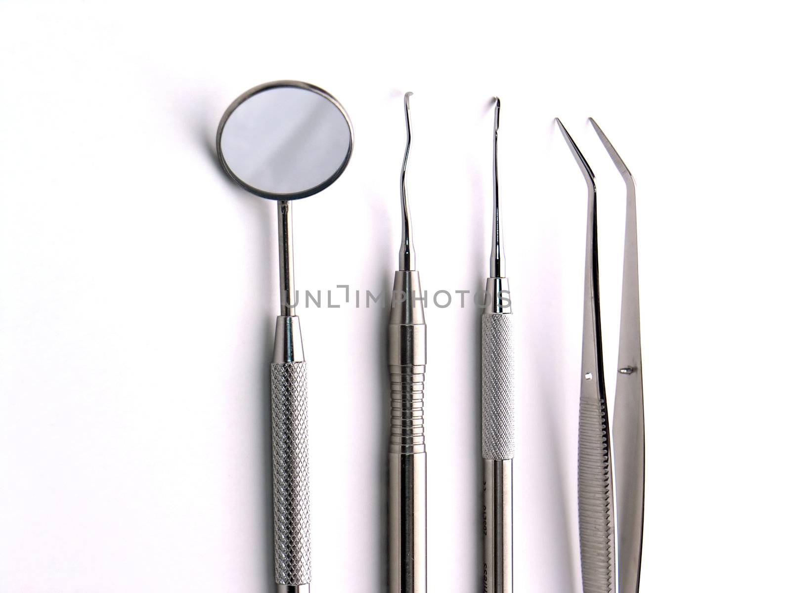 Close-up Dental Instruments on white background