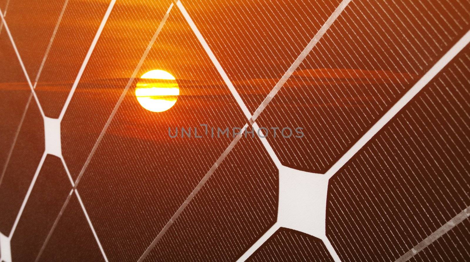 Renewable energy concept with photovoltaic panel and red sun