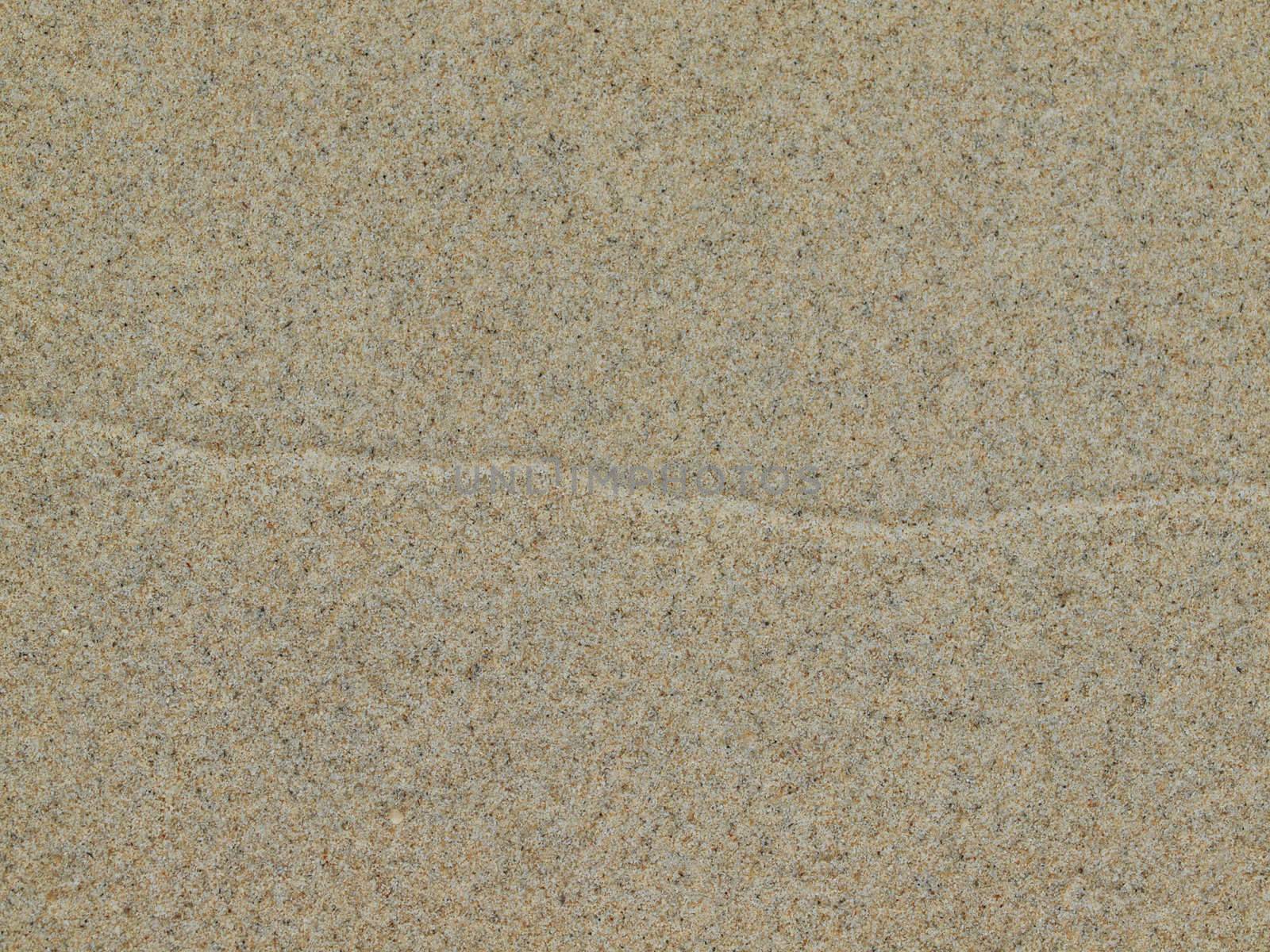Sand background with a crossing path line