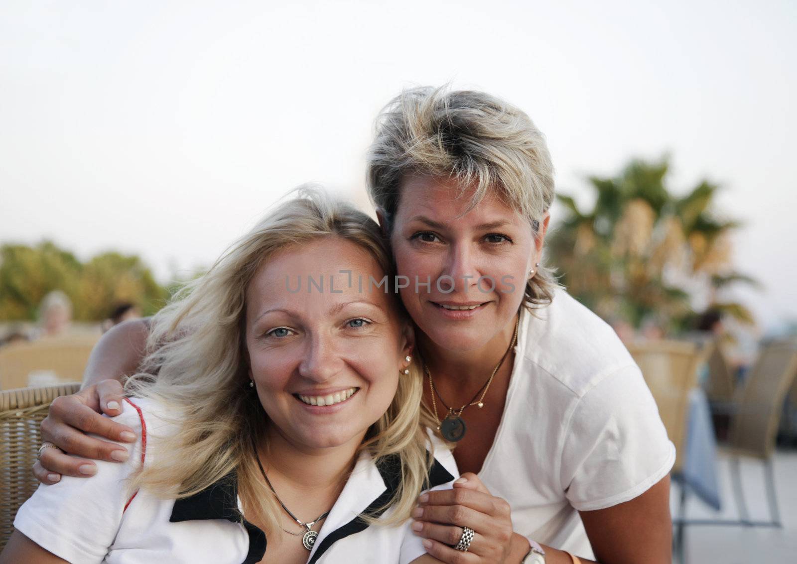 Portrait of two happy adult women
