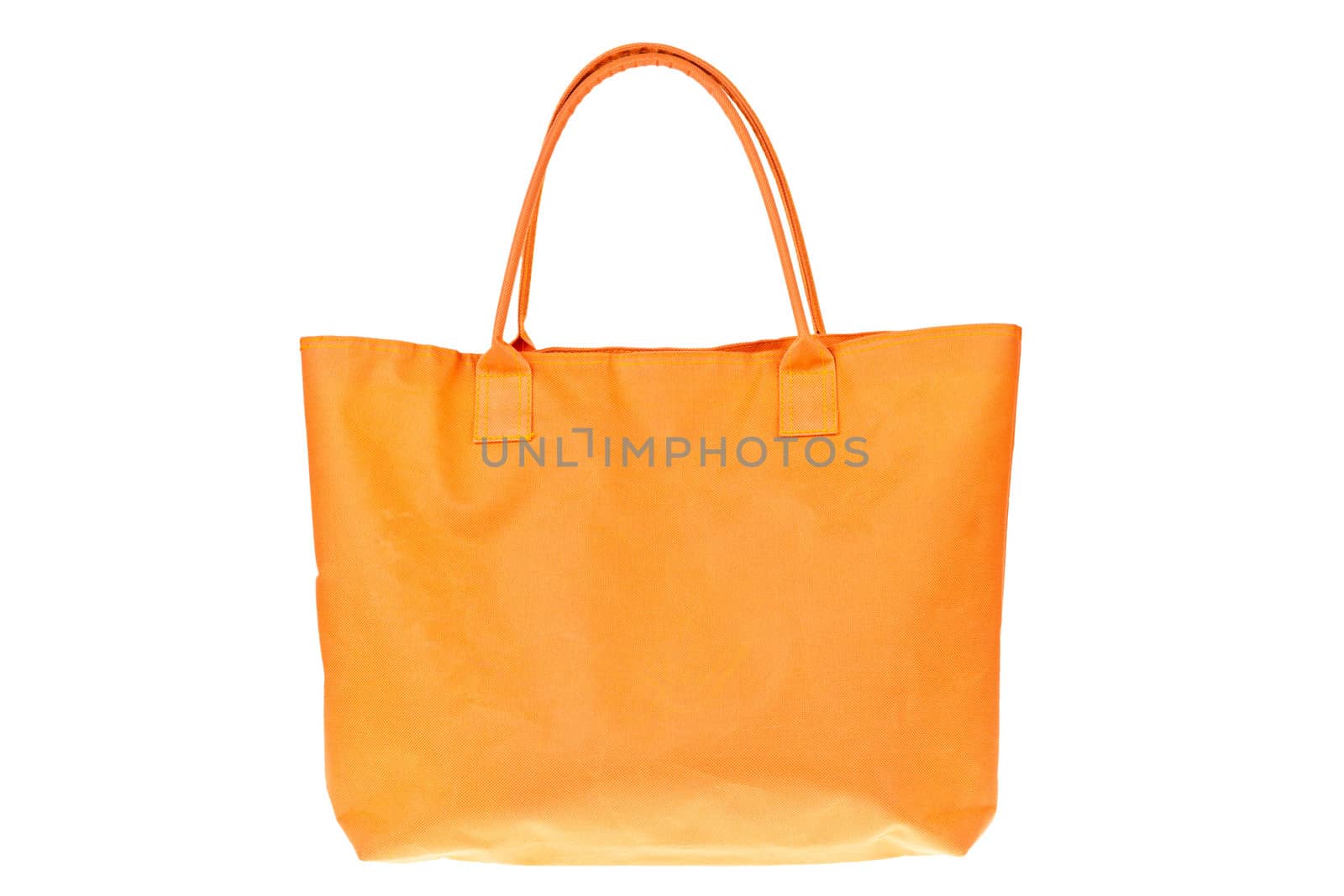 Colorful orange cotton bag on white isolated background.
