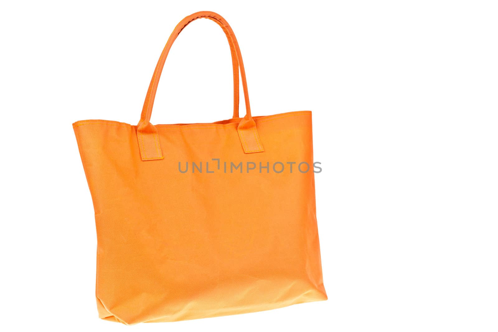 Colorful orange cotton bag on white isolated background.  by FrameAngel