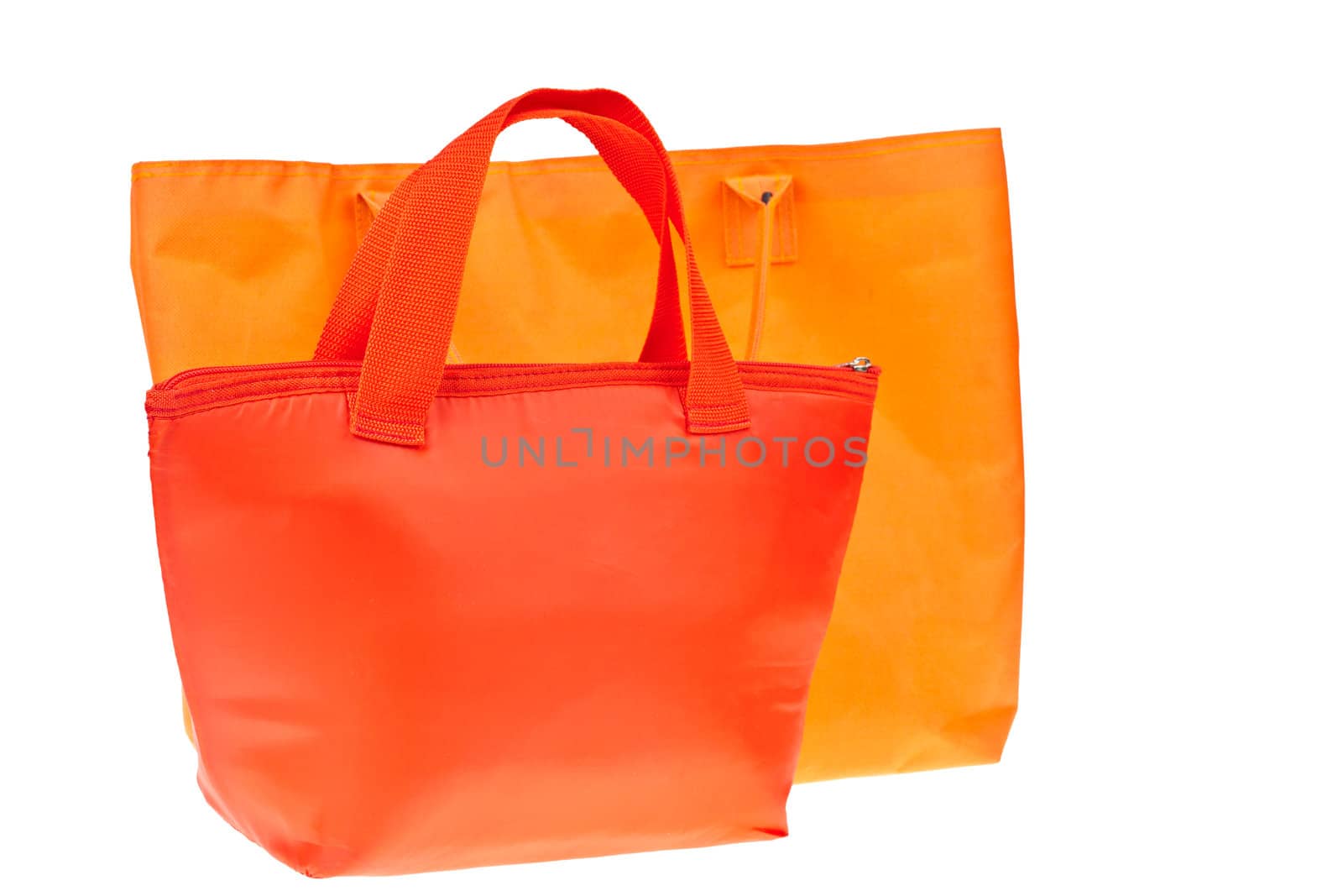 Colorful red and orange cotton bag on white isolated background. by FrameAngel