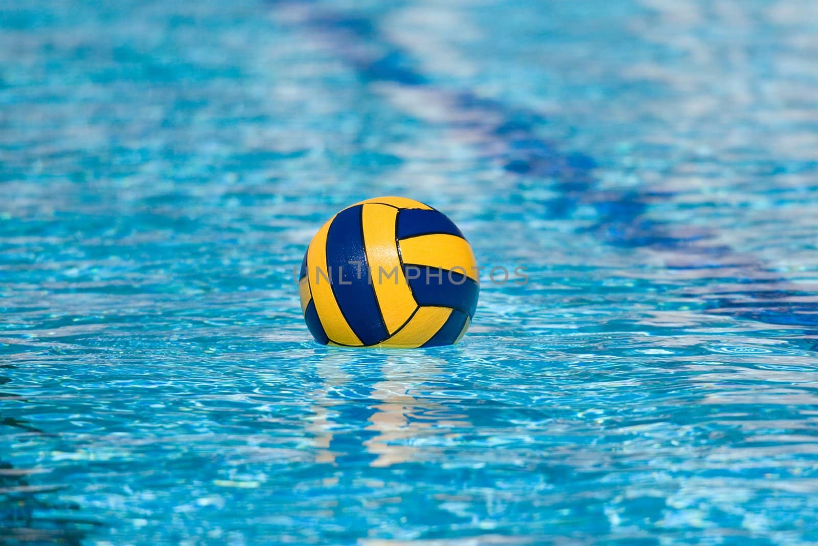 Water polo action and equipment in a swimming pool