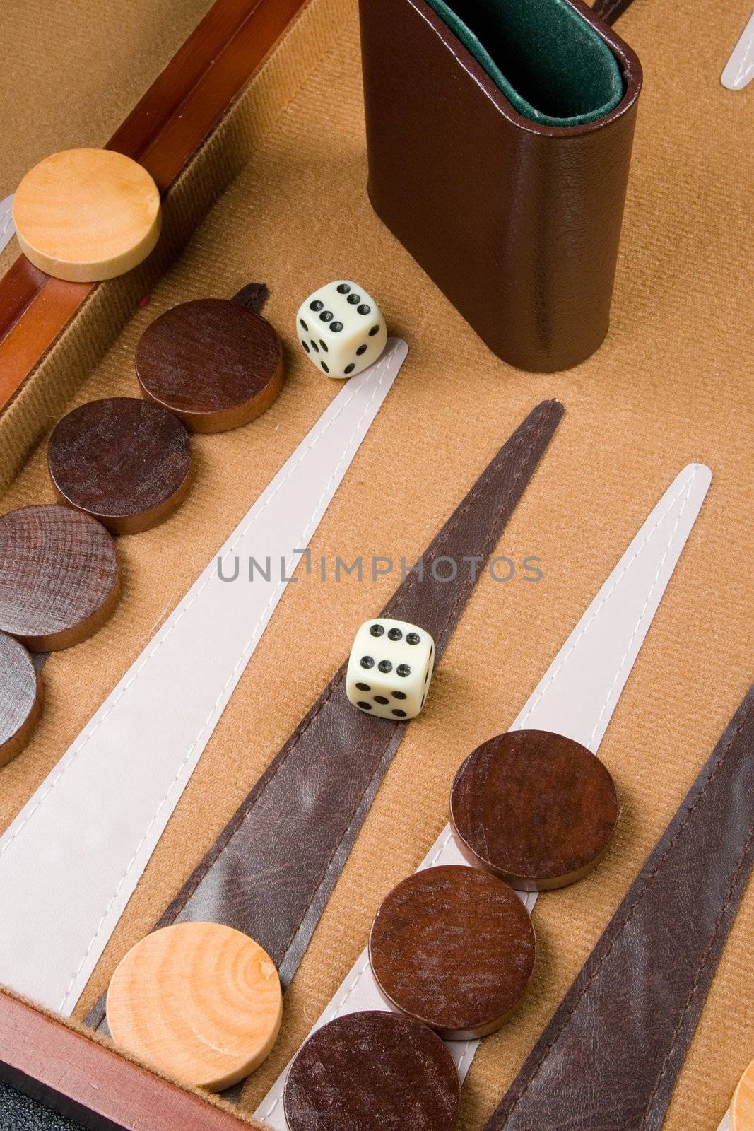 Backgammon game board with dice, pieces, and bars