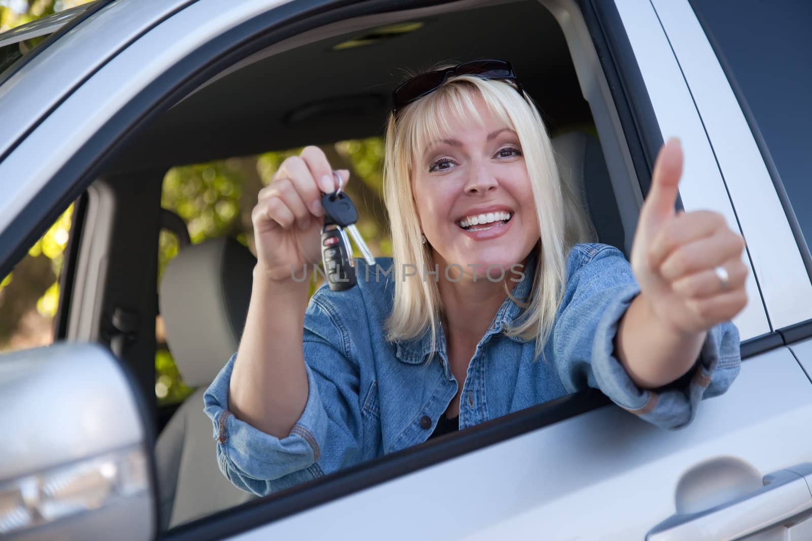 Attractive Woman In New Car with Keys by Feverpitched