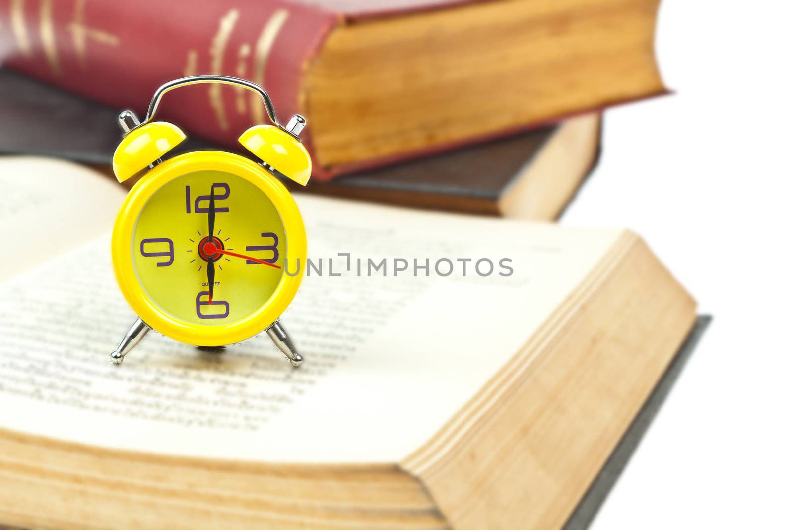 Clock and book as time management concept by FrameAngel