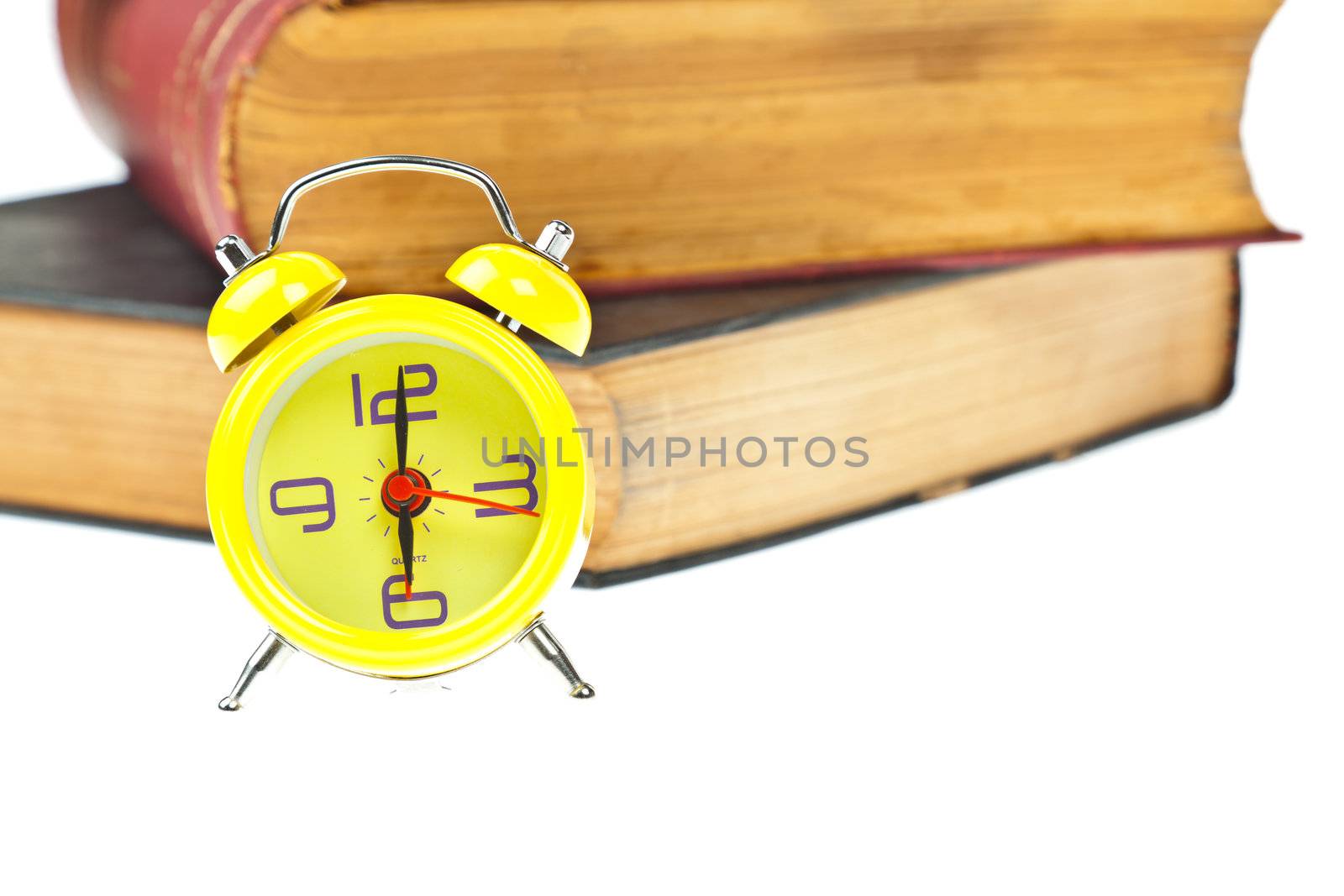 Clock and book as time management concept