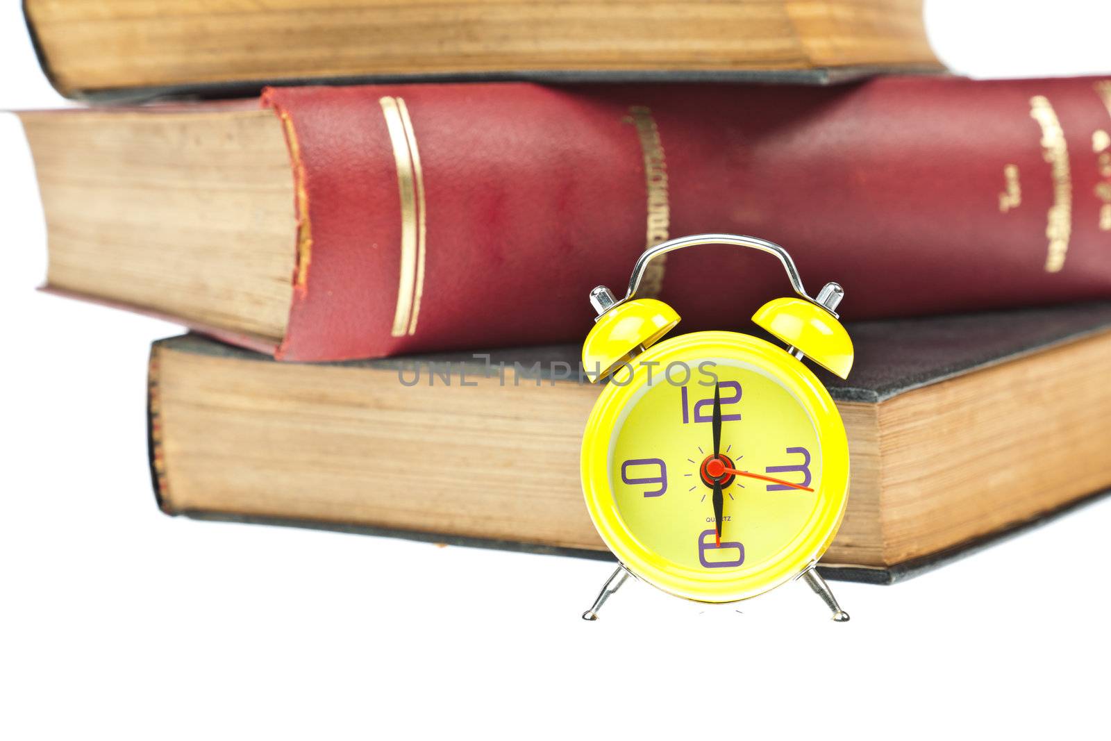 Clock and book as time management concept by FrameAngel