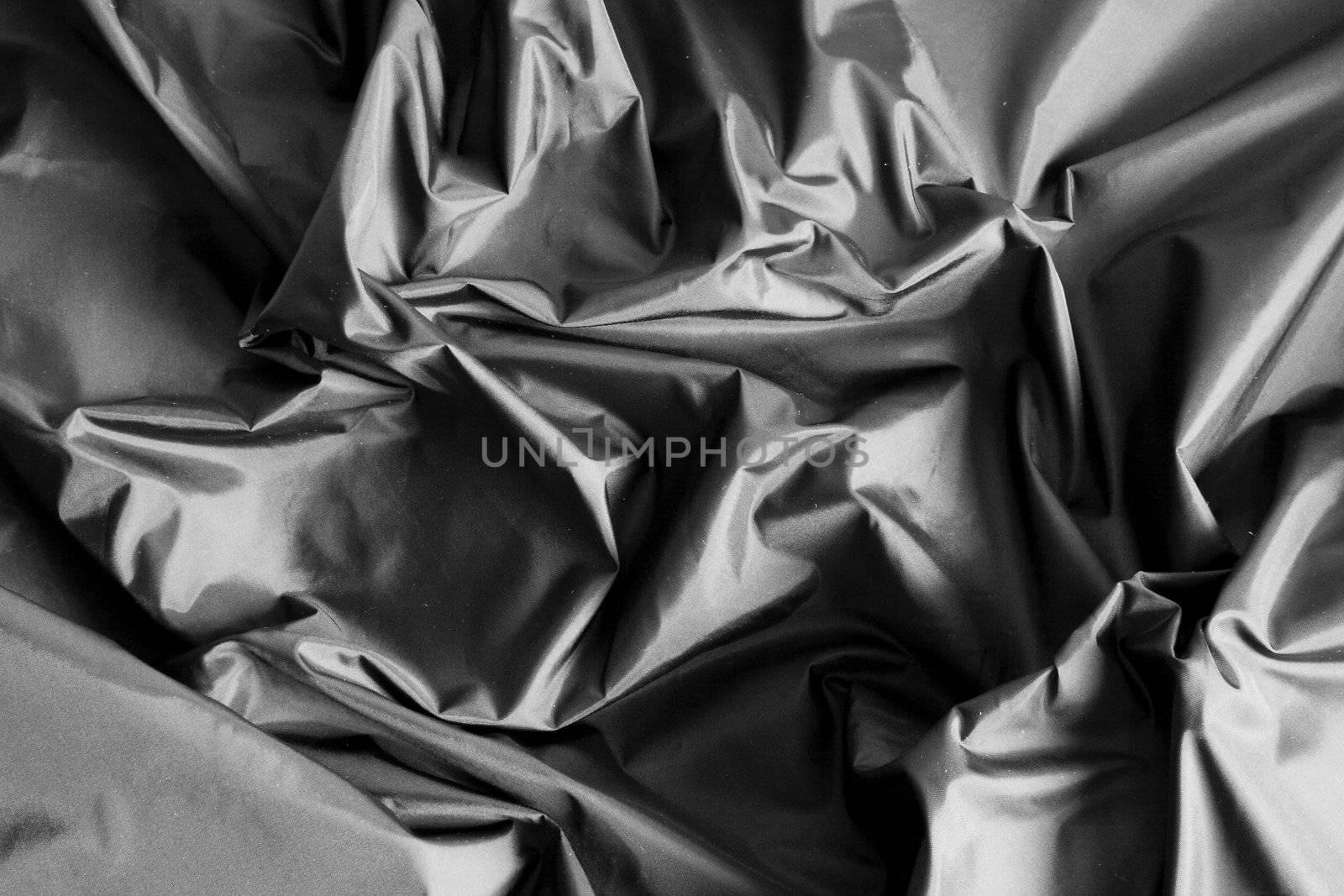 image of a black fabric with a lot of wrinkles