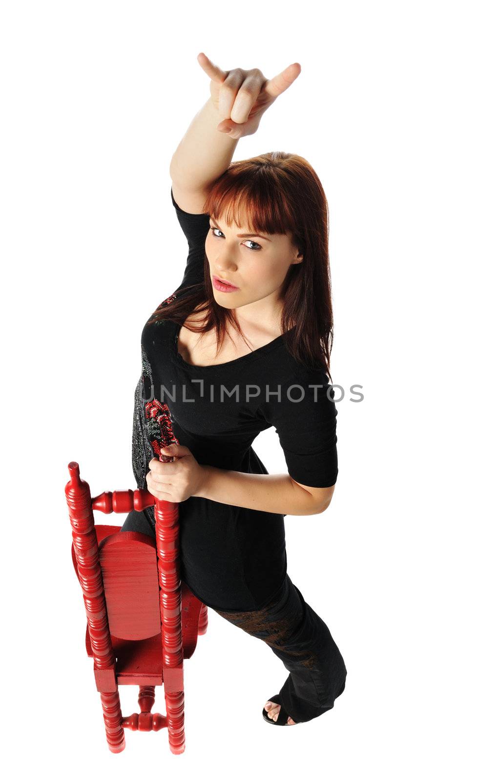 attractive young model having fun posing on a white background