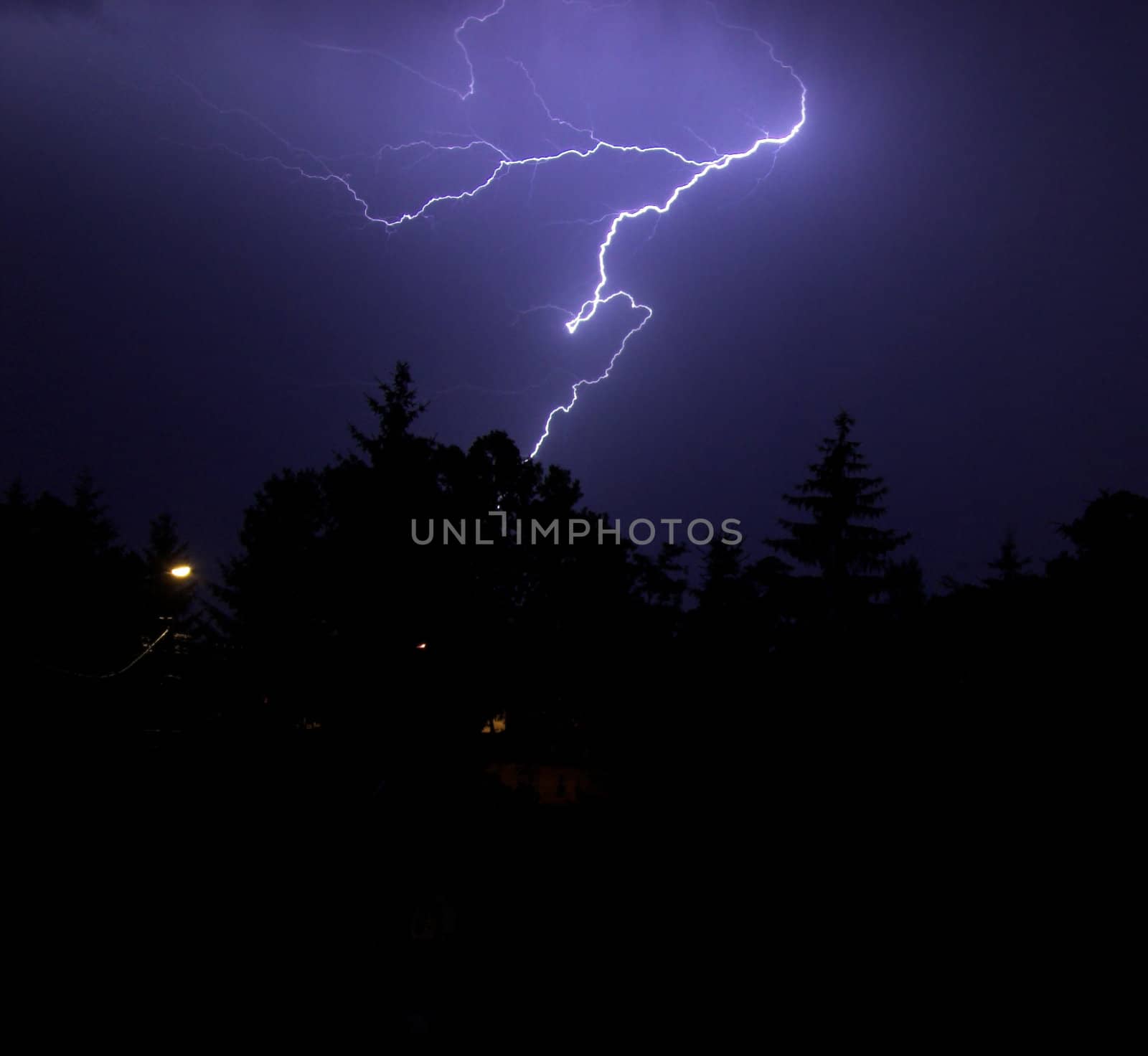 thunderbolt in the night sity stock photo